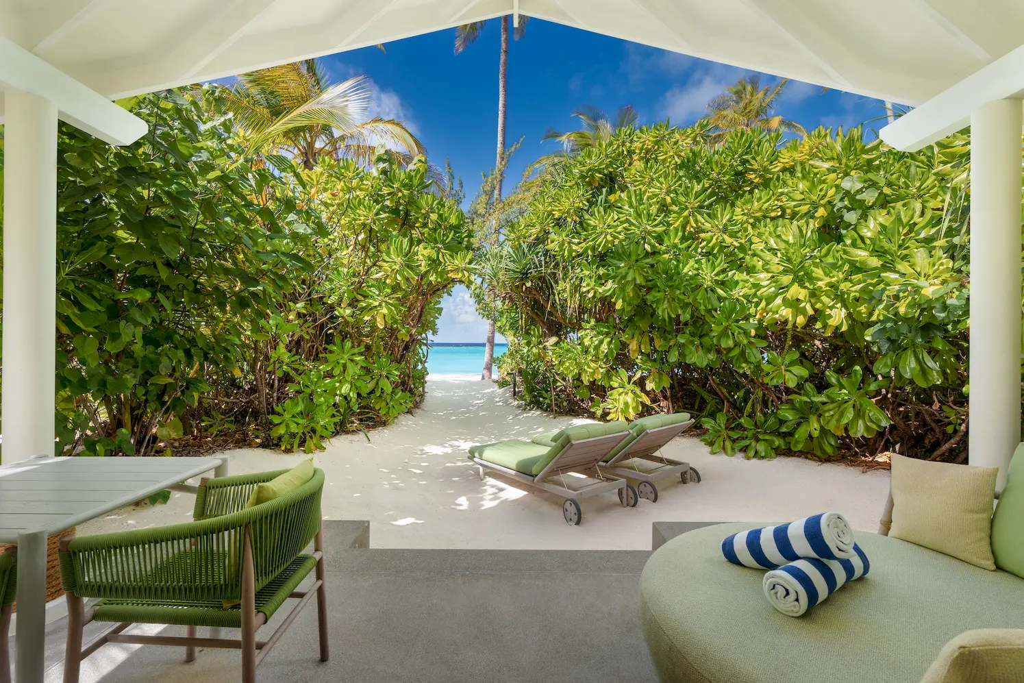 raaya by atmosphere raa atoll maldives beach villa terrace with serene ocean ambiance
