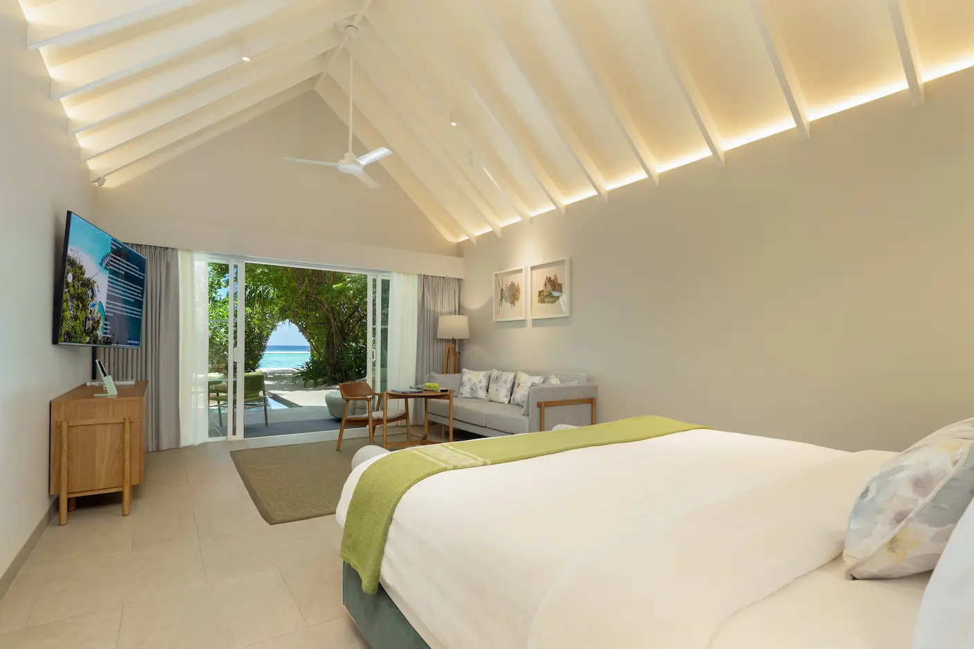 raaya by atmosphere raa atoll maldives beach villa with pool bedroom view overlooking a calm tropical horizon