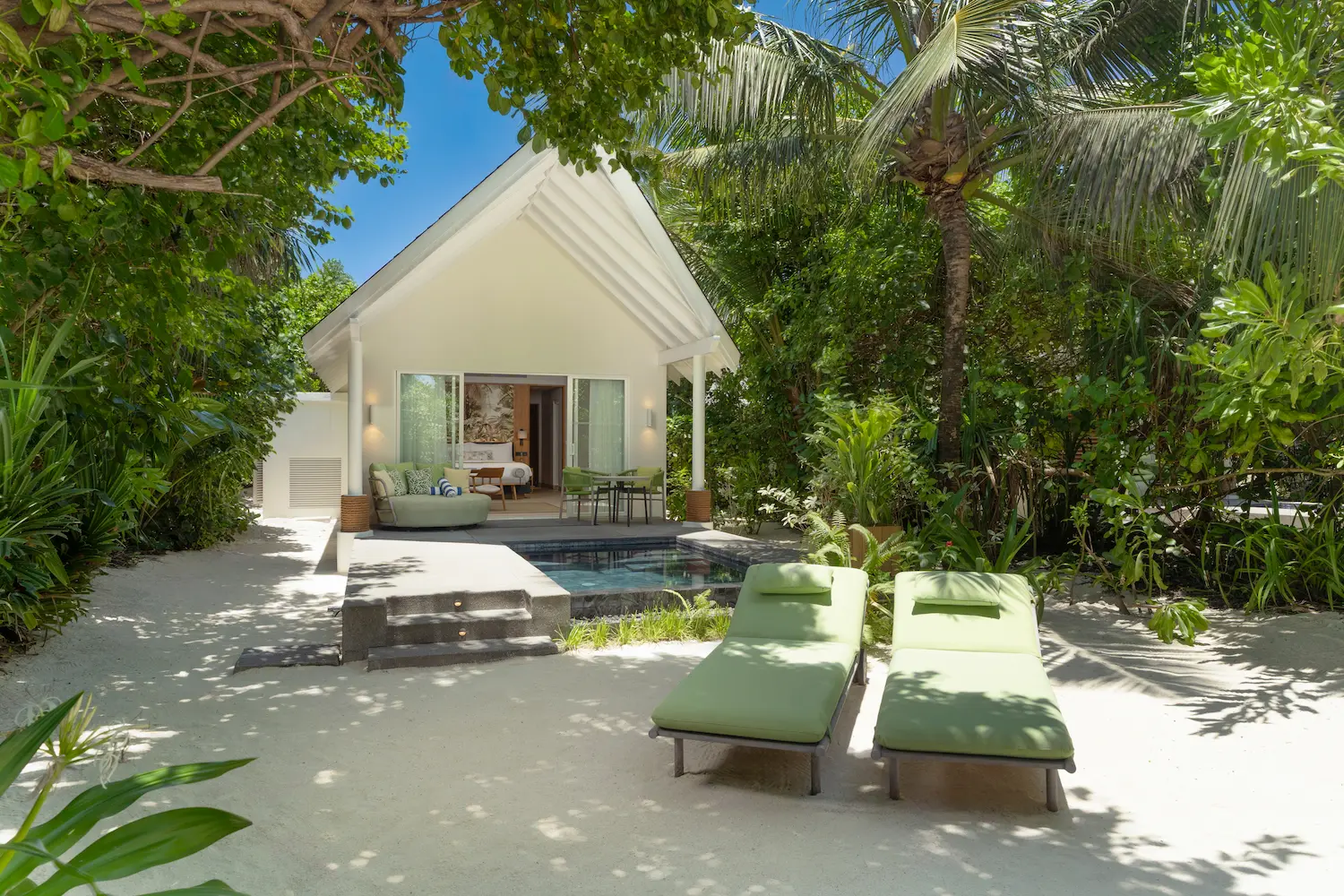 raaya by atmosphere raa atoll maldives beach villa with pool exterior in a calm tropical setting