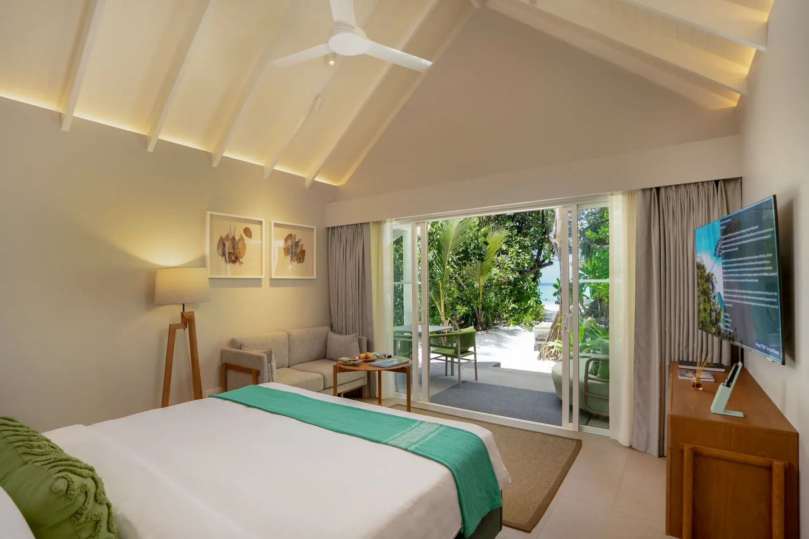 raaya by atmosphere raa atoll maldives family beach villa bed terrace with a calm tropical ambiance