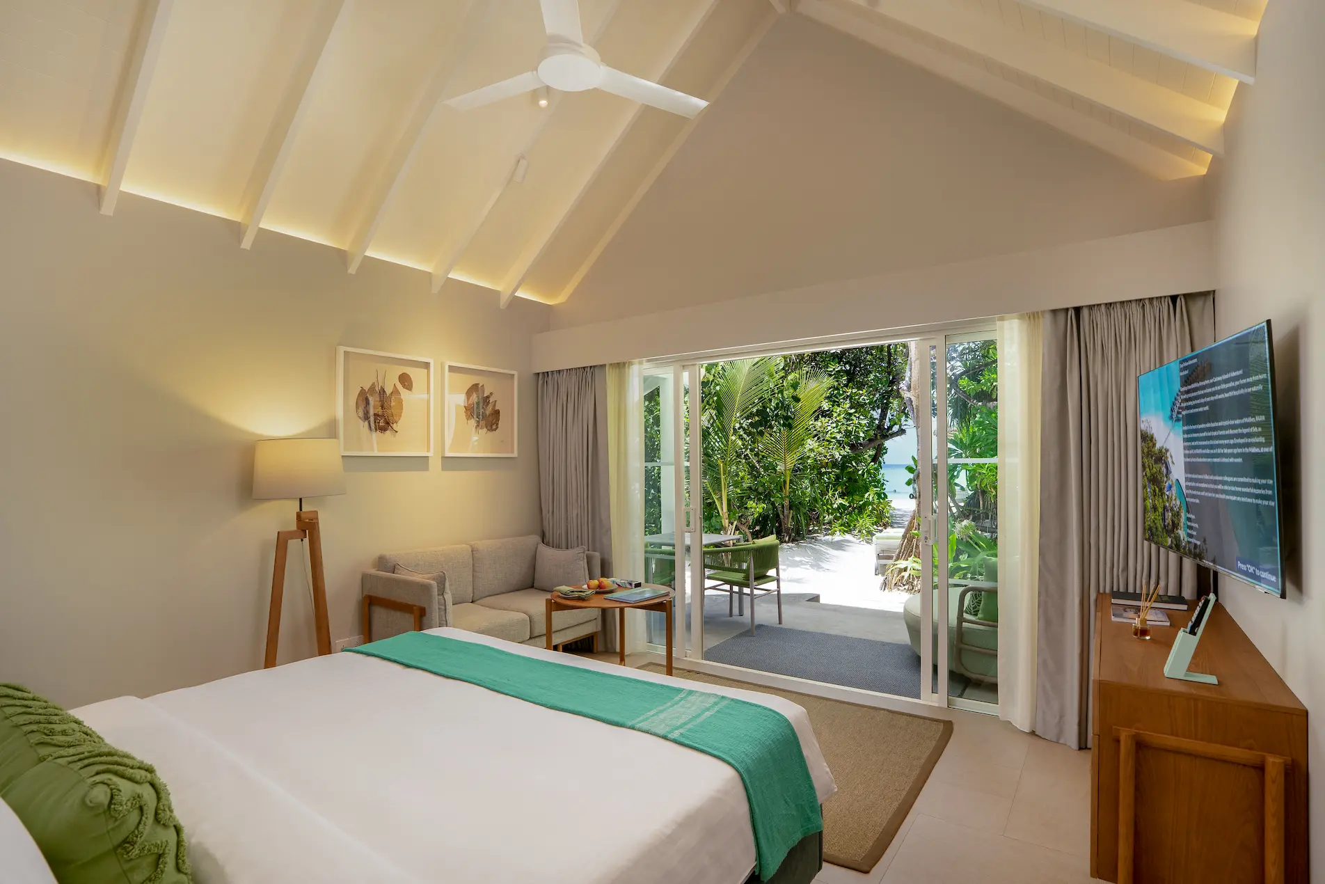 raaya by atmosphere raa atoll maldives family beach villa bed terrace with a calm tropical ambiance