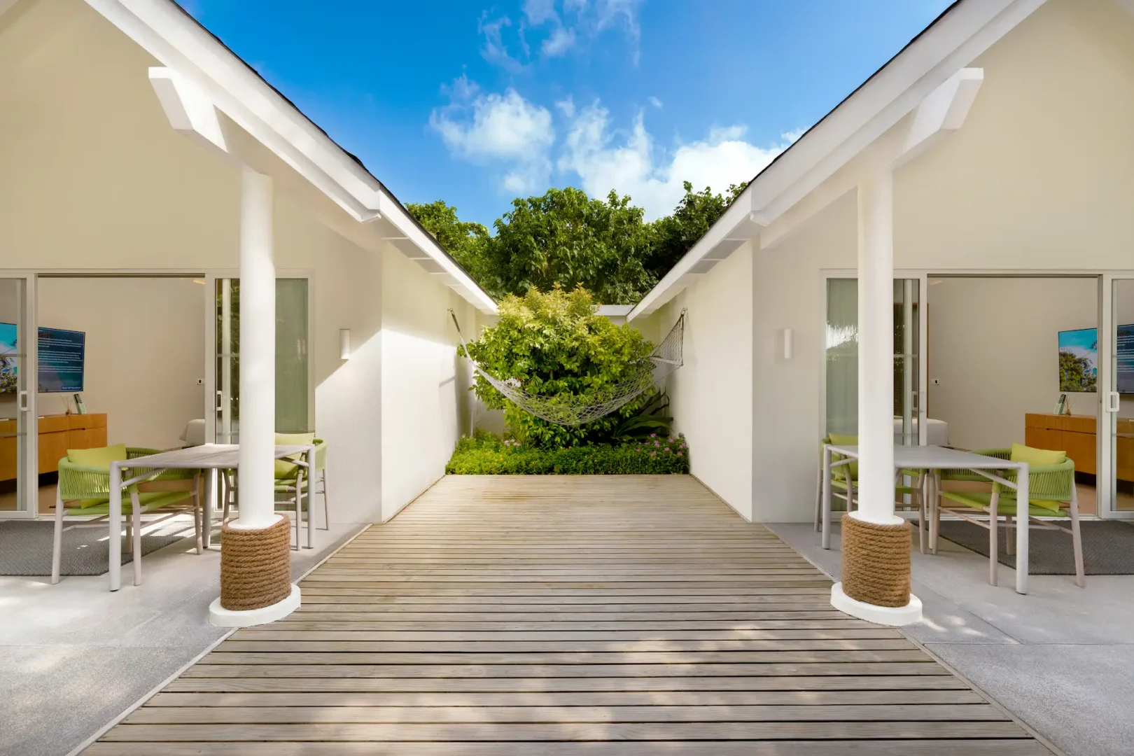 raaya by atmosphere raa atoll maldives family beach villa interconnecting with a serene tropical ambiance