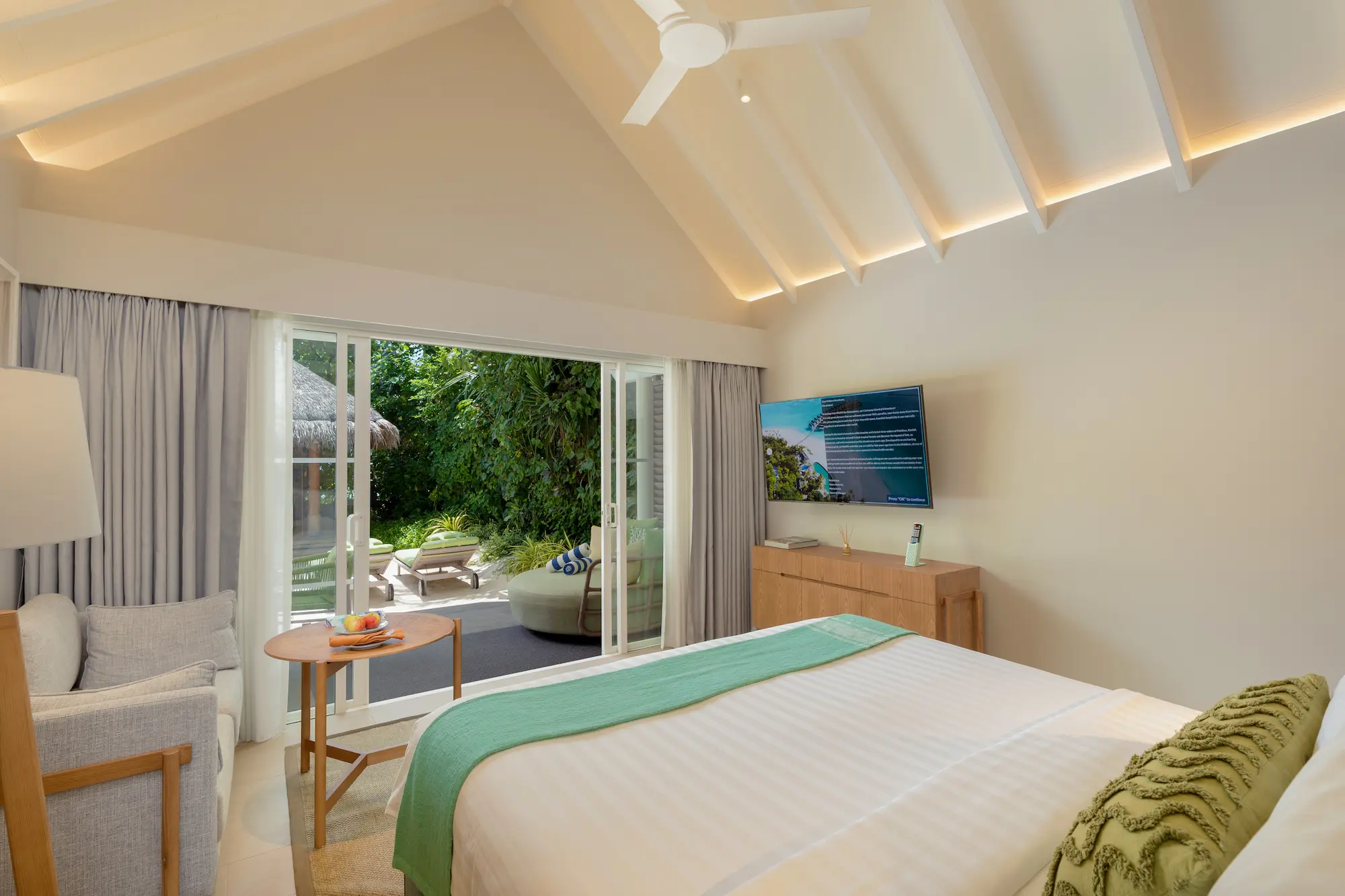 raaya by atmosphere raa atoll maldives family beach villa with pool second bed view overlooking a calm tropical landscape