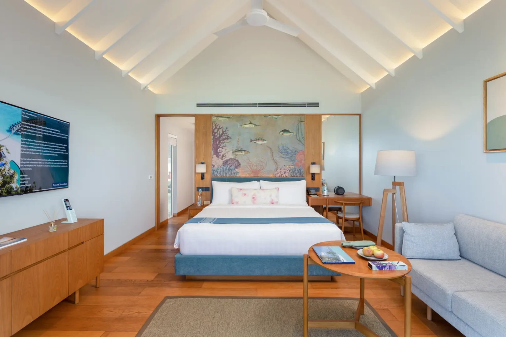 raaya by atmosphere raa atoll maldives water villa bed with refined coastal ambiance