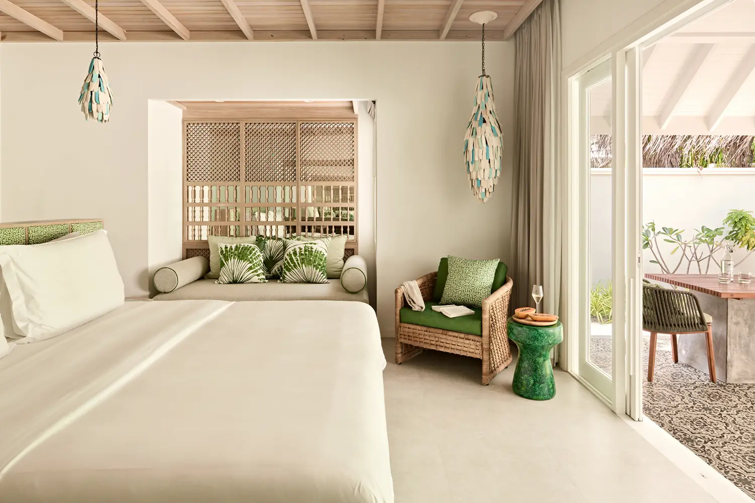 seaside finolhu beach villa second bedroom two bedroom interconnecting beach villa featuring elegant coastal design warm natural textures and serene maldives island ambience