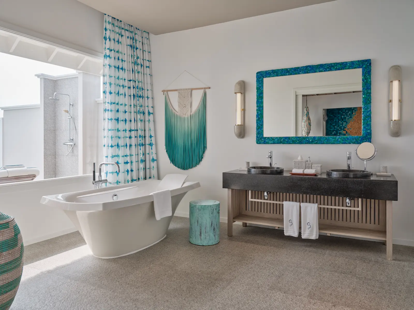 seaside finolhu lagoon villa bathroom featuring elegant overwater design natural textures and serene maldives lagoon views