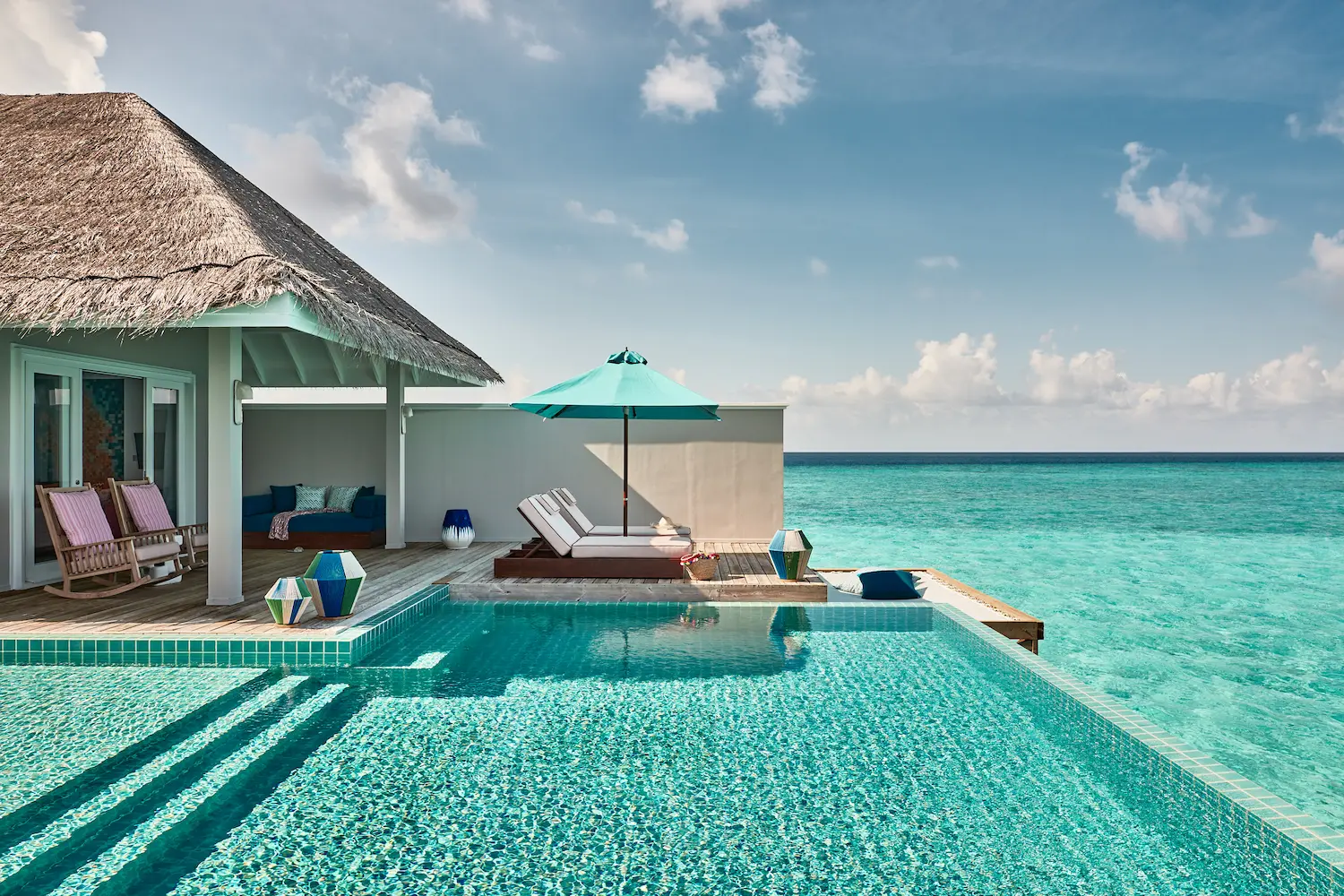 seaside finolhu maldives two bedroom rockstar villa sundeck and pool spacious sunlit deck with private pool and calm ocean backdrop