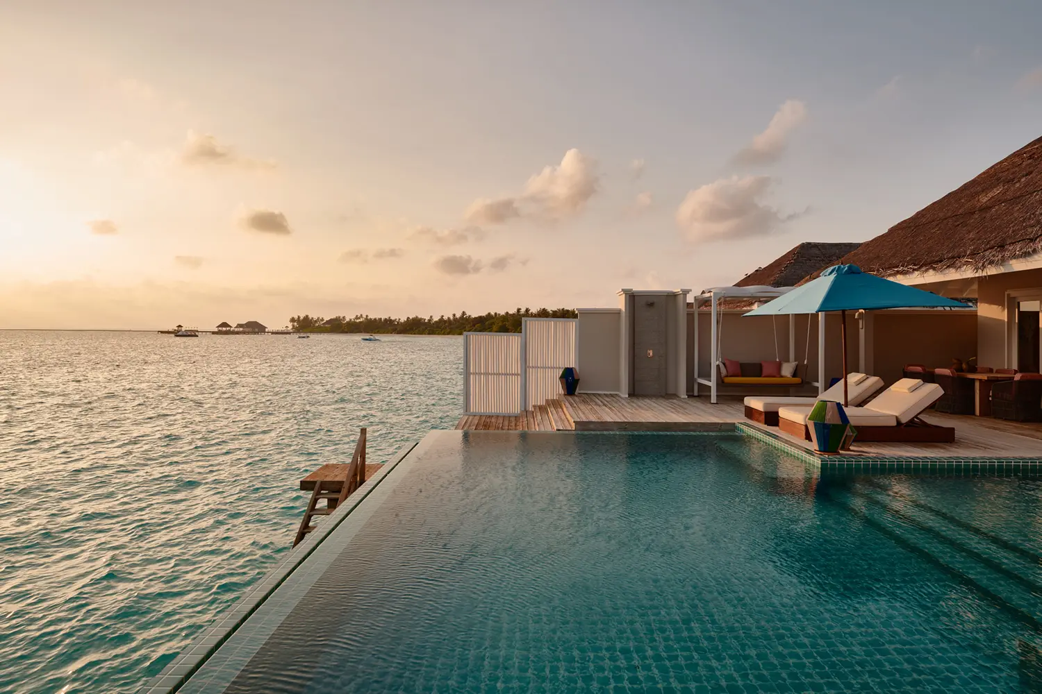 seaside finolhu maldives two bedroom water villa pool area calm overwater deck with private pool and uninterrupted lagoon views