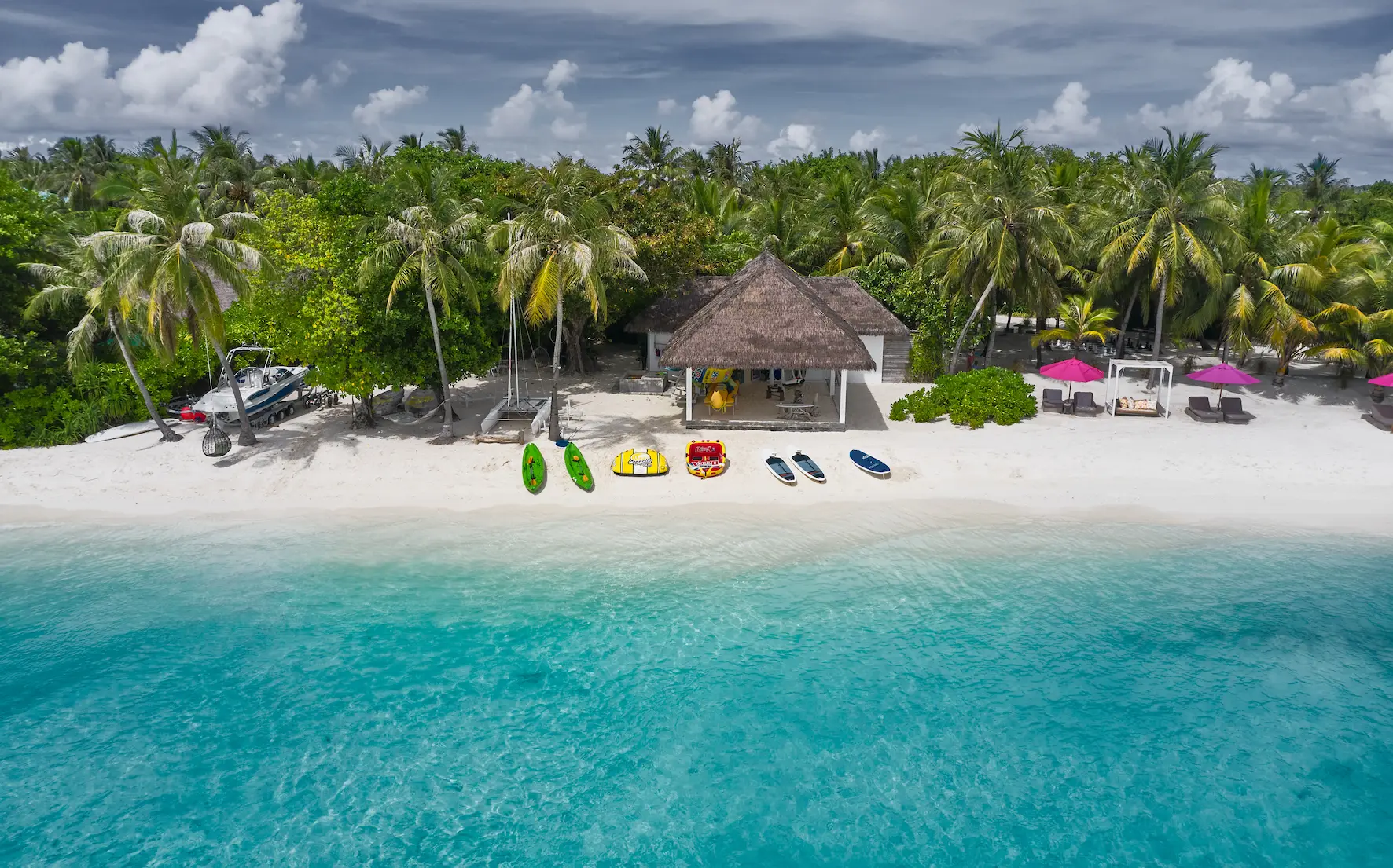 seaside finolhu maldives water sports beach vibrant shoreline area offering gentle waves and a relaxed island adventure atmosphere