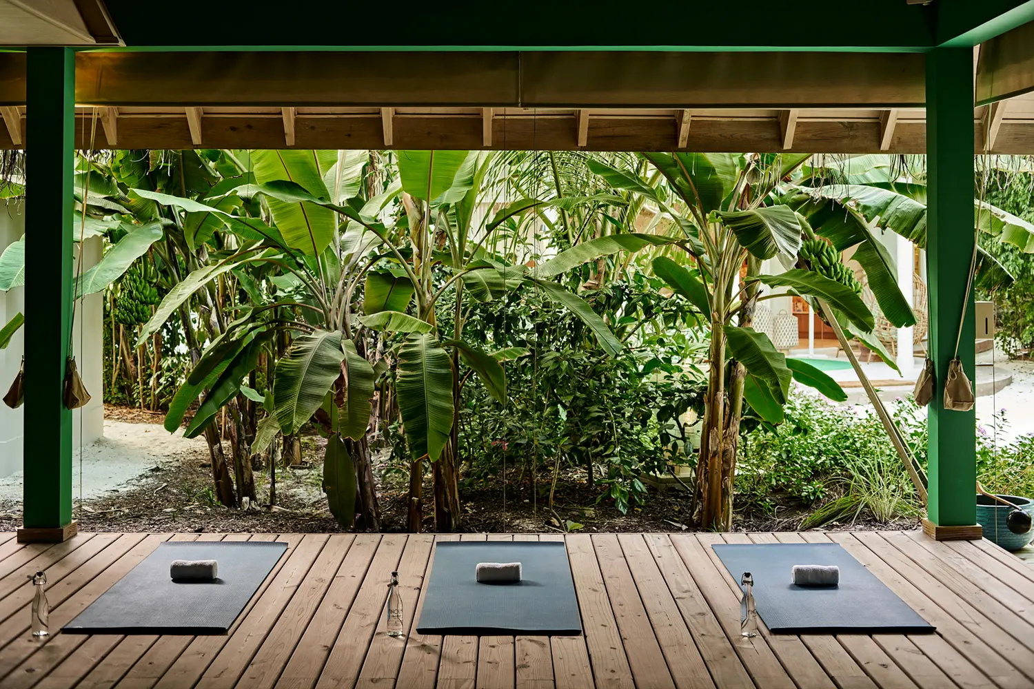 seaside finolhu maldives yoga area tranquil open practice space with soft natural surroundings and calming island energy
