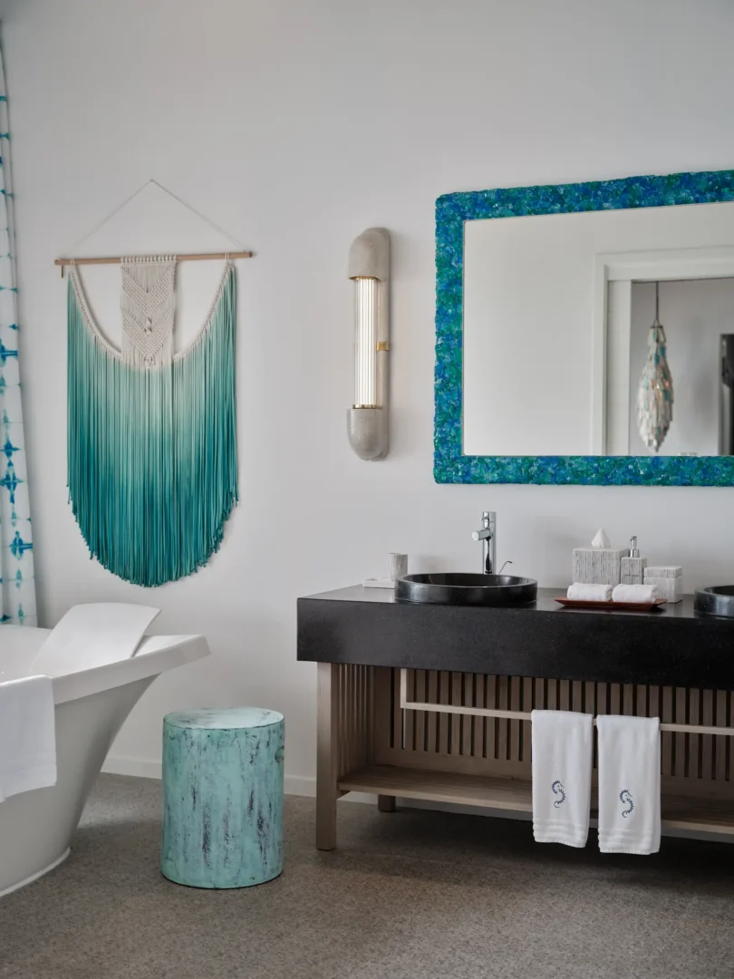 seaside finolhu ocean pool villa bathroom featuring elegant coastal design natural textures and serene maldives ocean views