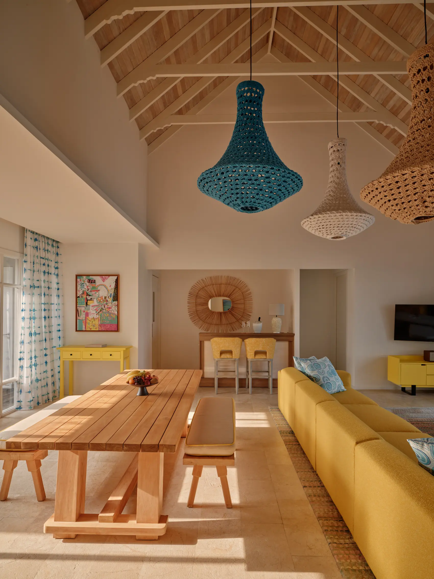 seaside finolhu two bedroom water villa with pool living and dining area featuring spacious overwater design natural textures and serene maldives ocean views