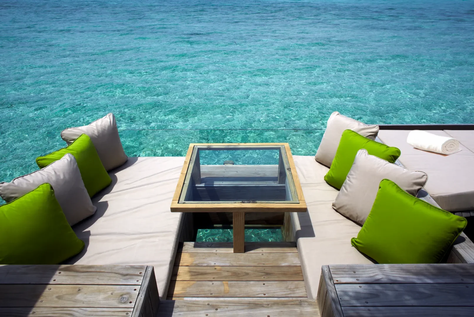six senses laamu maldives laamu water villa with pool deck overlooking the lagoon with natural wood design and a serene elevated barefoot luxury atmosphere