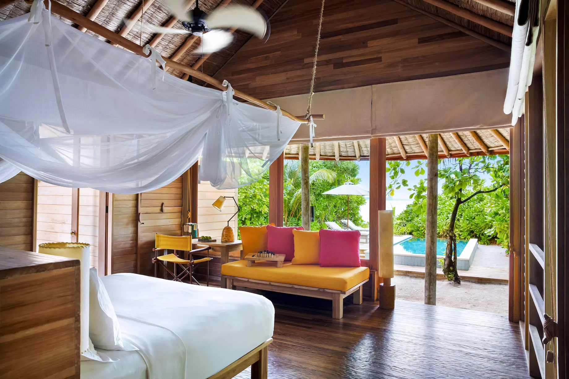 six senses laamu maldives ocean beach villa with pool interior featuring natural textures soft warm lighting and a calm elevated barefoot luxury atmosphere