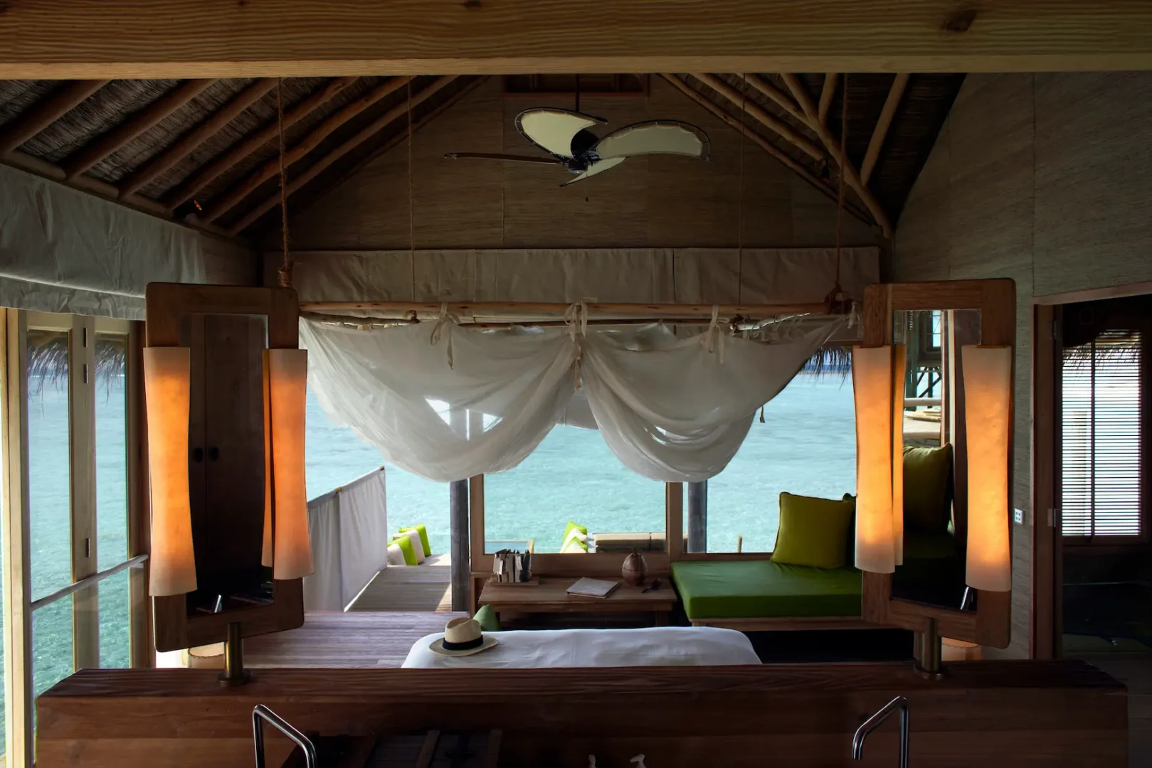 six senses laamu maldives ocean water villa interior with natural textures open airy design and a calm elevated barefoot luxury feel