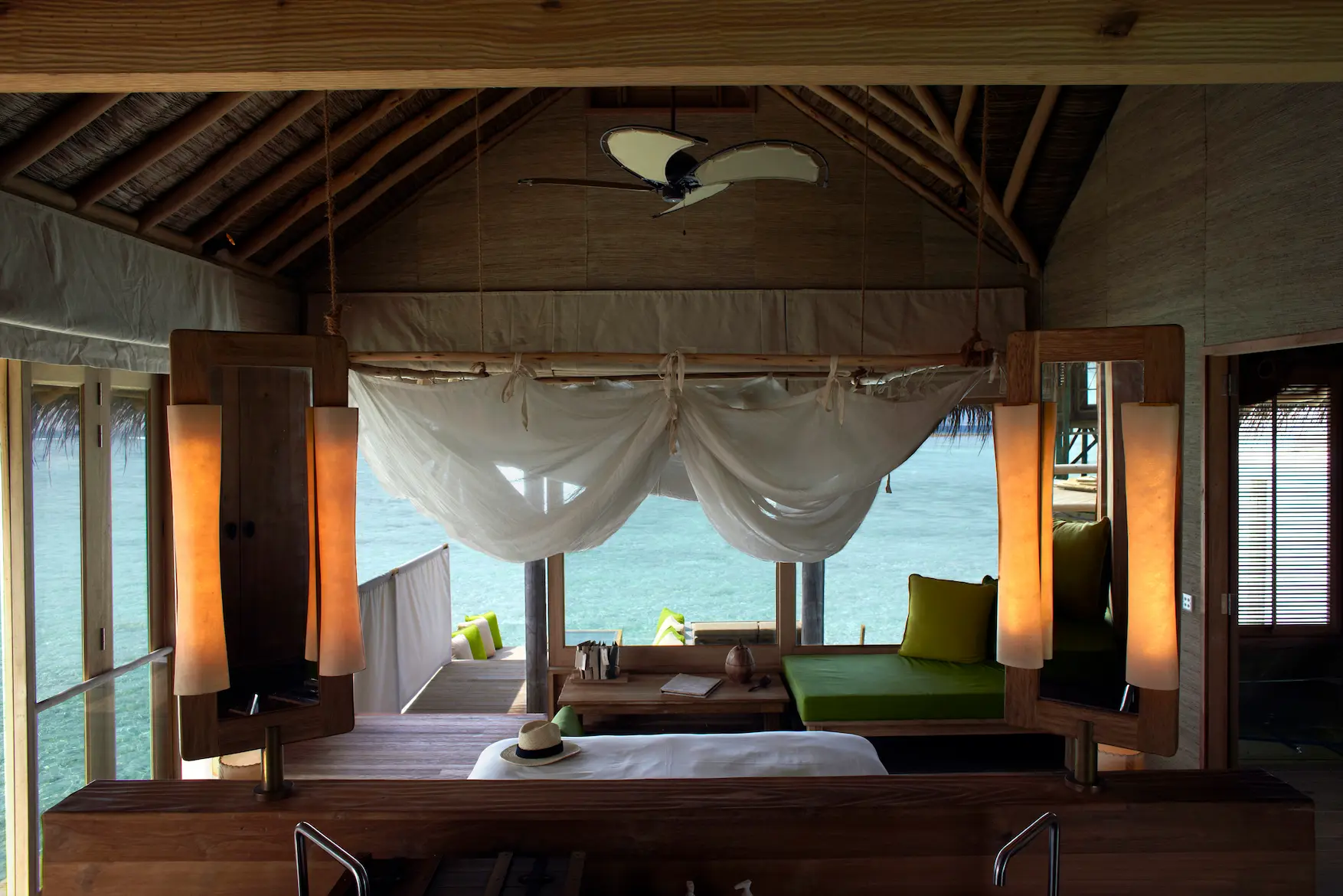 six senses laamu maldives ocean water villa interior with natural textures open airy design and a calm elevated barefoot luxury feel