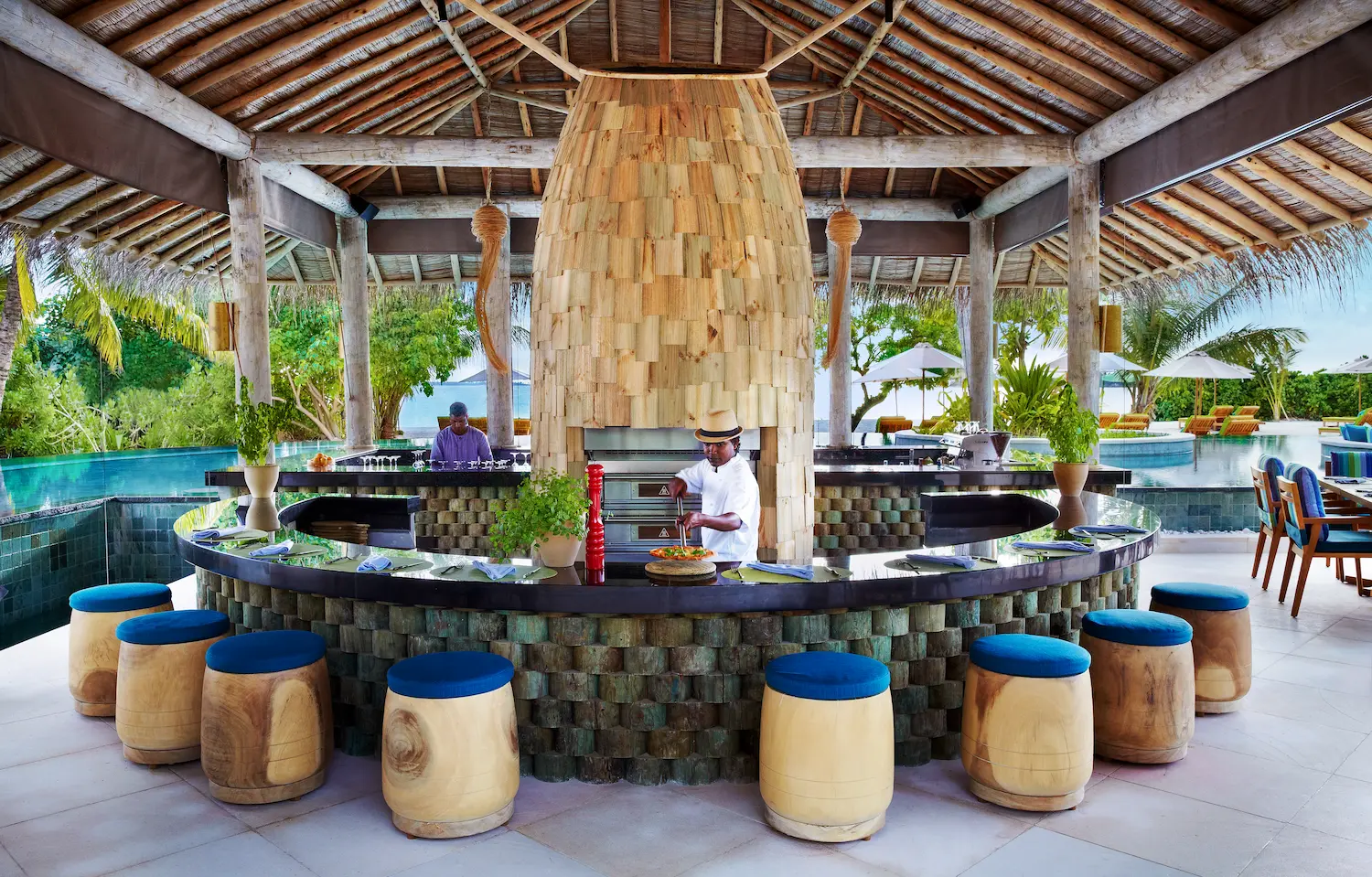 six senses laamu maldives sip sip restaurant with lagoonfront views natural wood styling and a relaxed refined barefoot luxury atmosphere