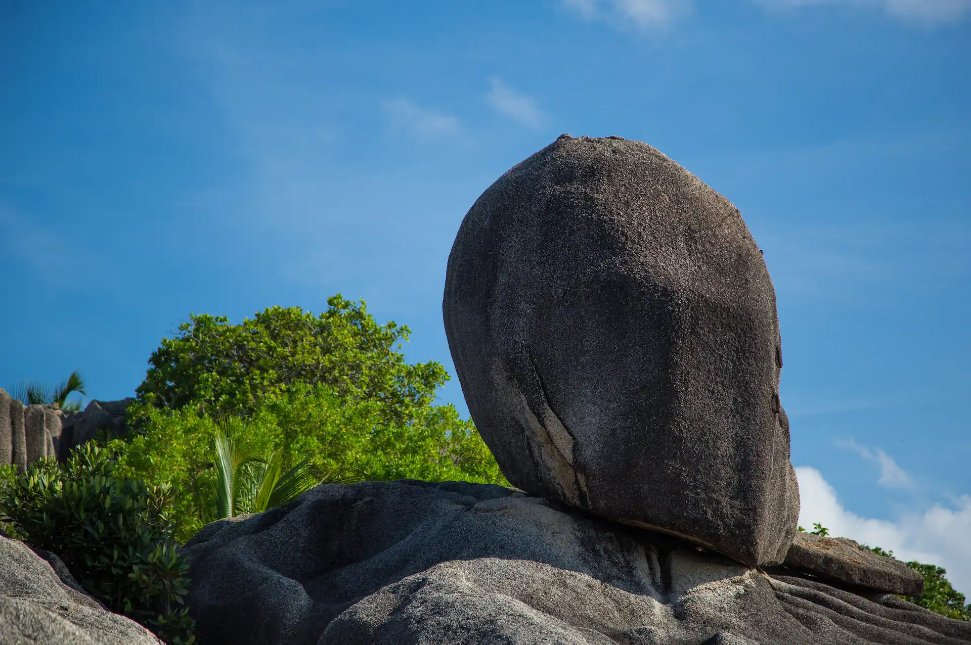 large granite boulders along the shoreline