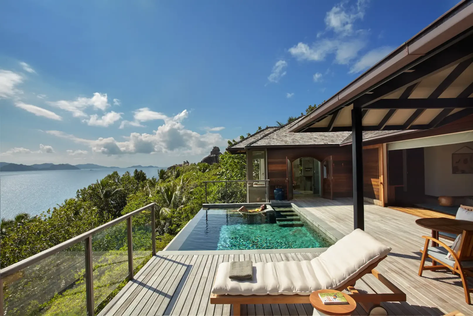 six senses seychelles panorama pool villa pool deck with lounge area
