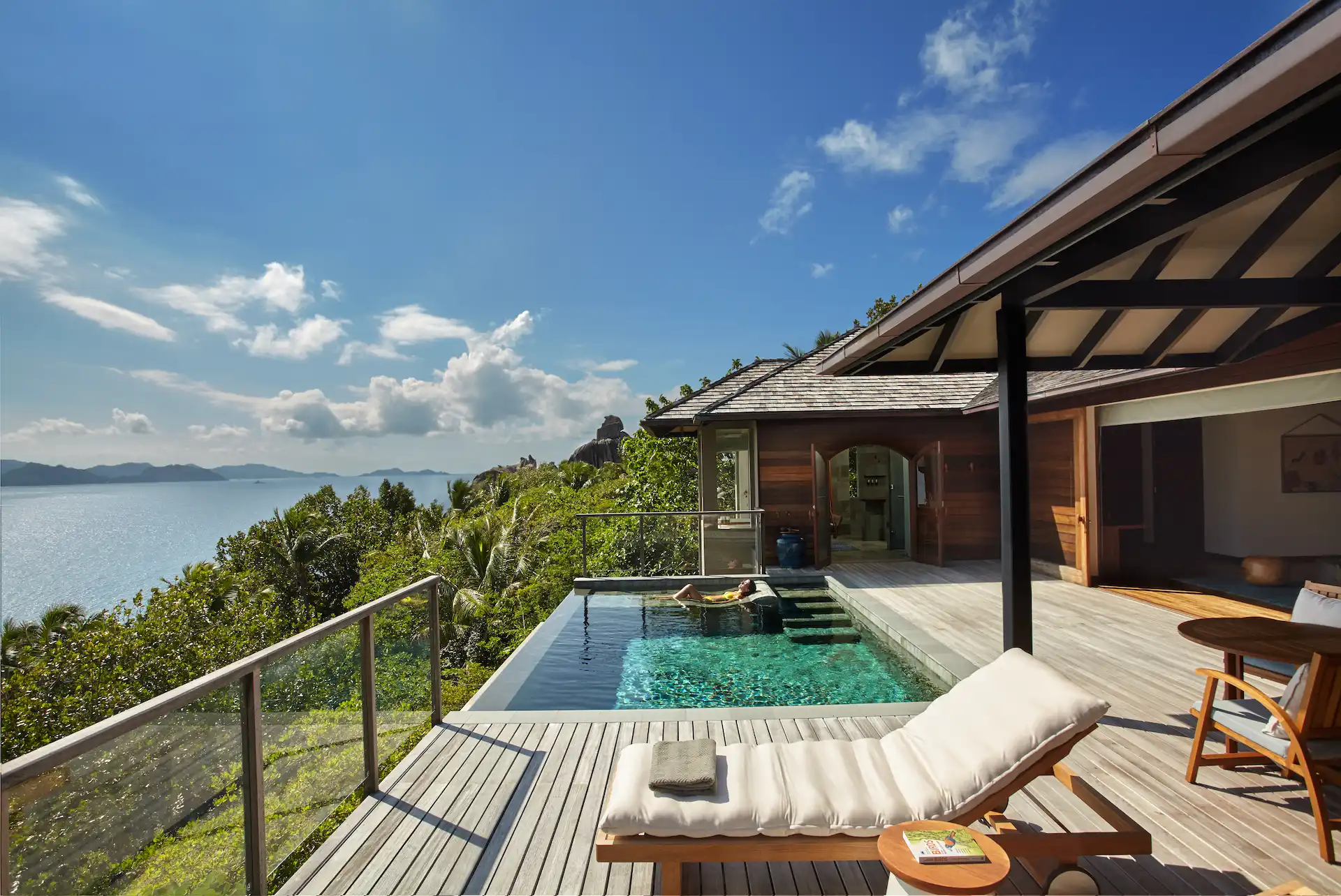 six senses seychelles panorama pool villa pool deck with lounge area