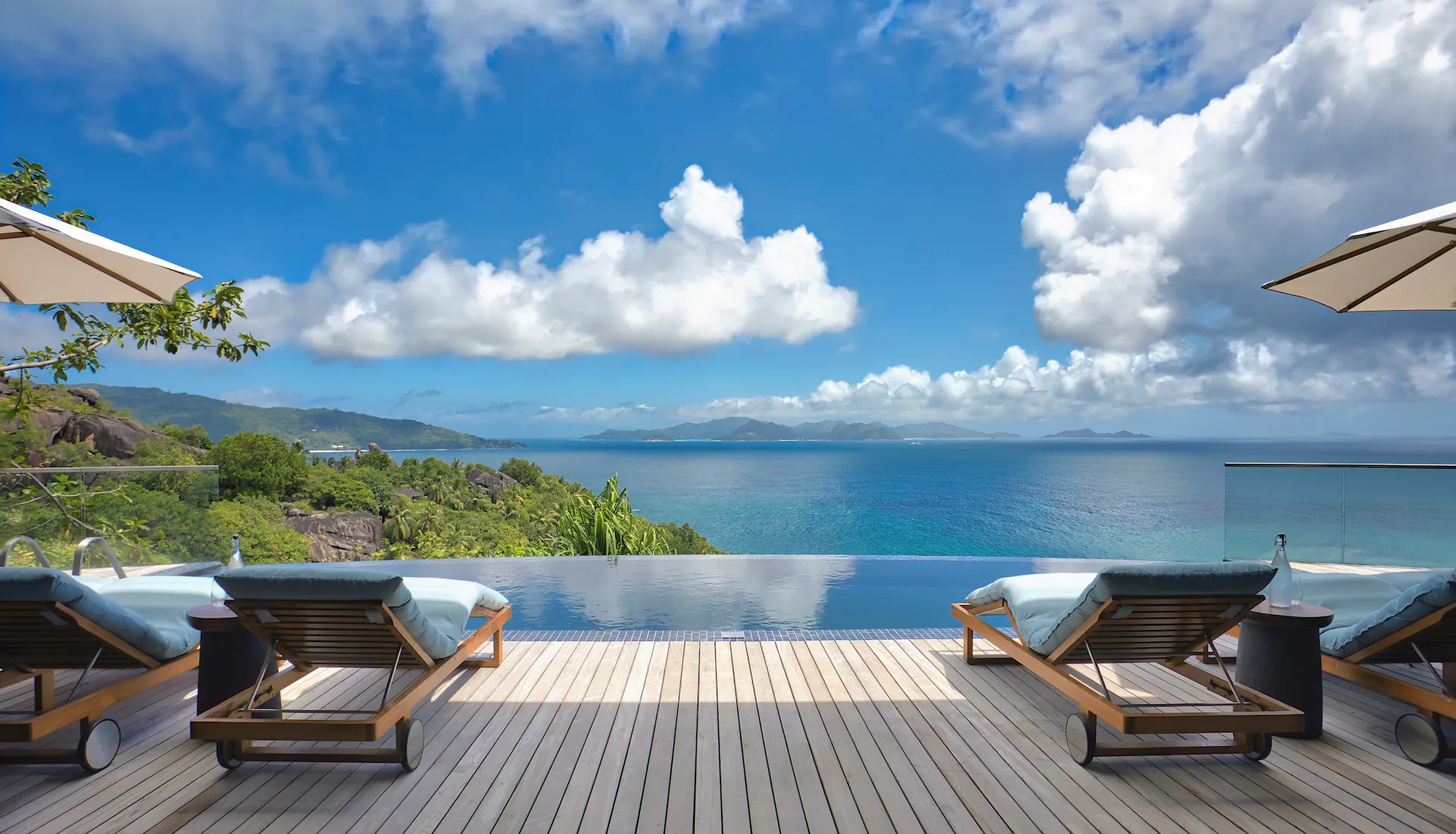six senses seychelles seascape three bedroom residence main pool decking area with loungers