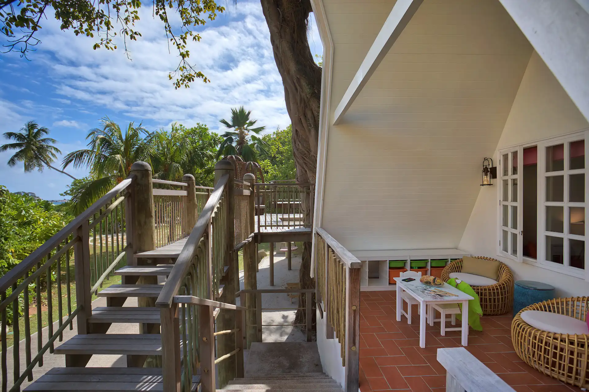 children playing at troulouolou kids club in six senses seychelles with activity area and ocean view