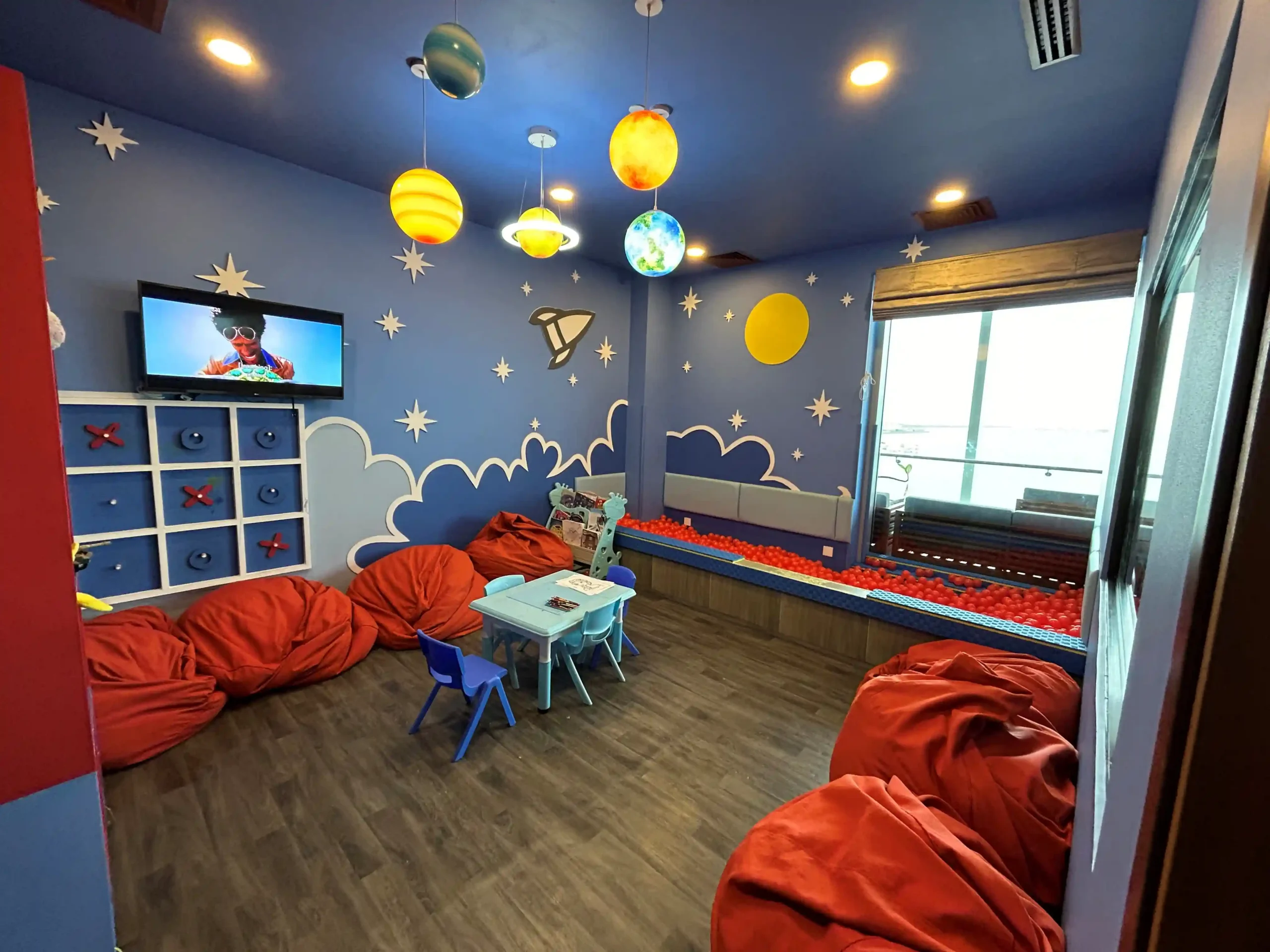 sun siyam maldives kids room with colorful beds and playful decor