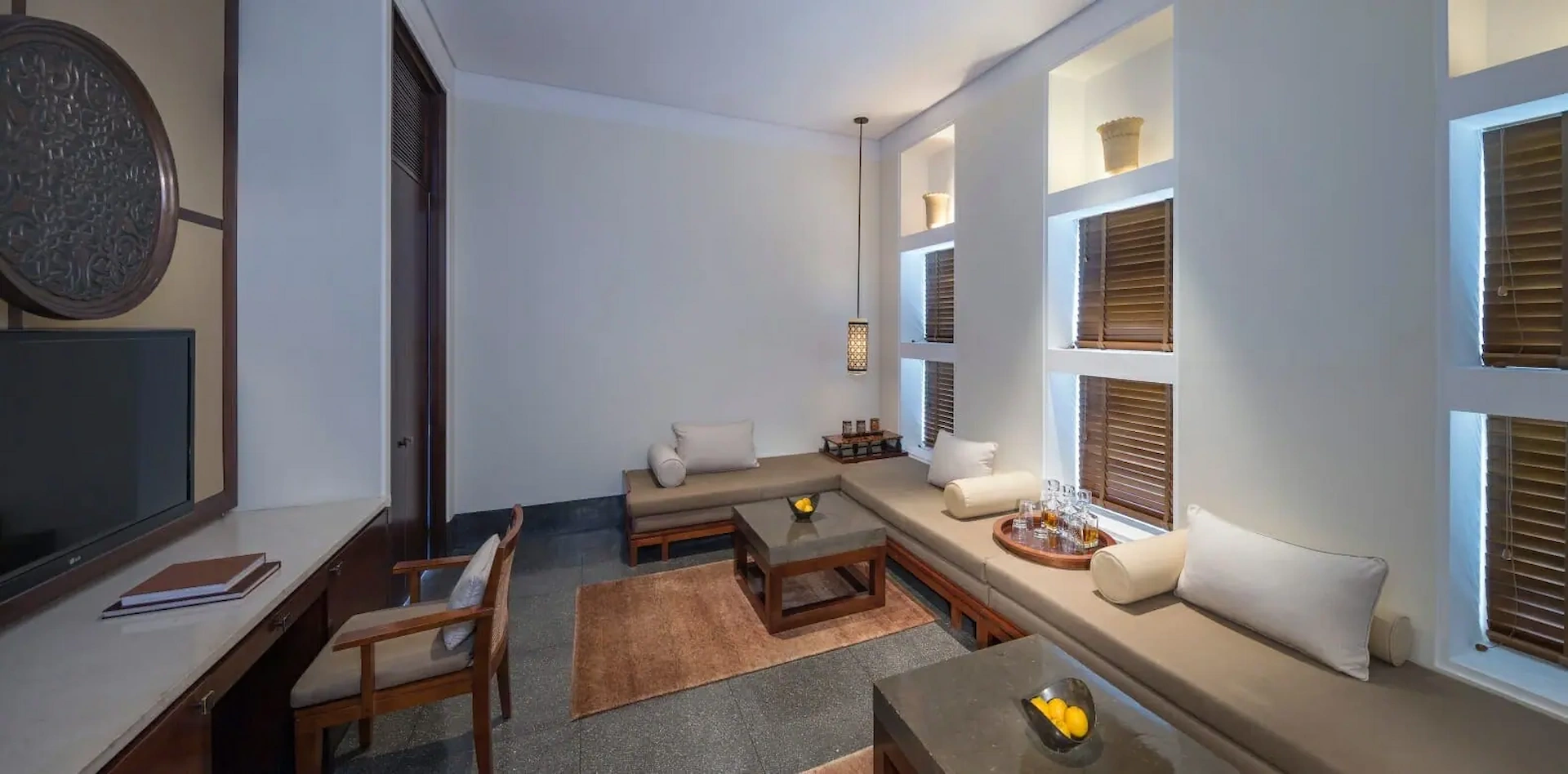 the chedi club suite sunken living room at the chedi muscat oman