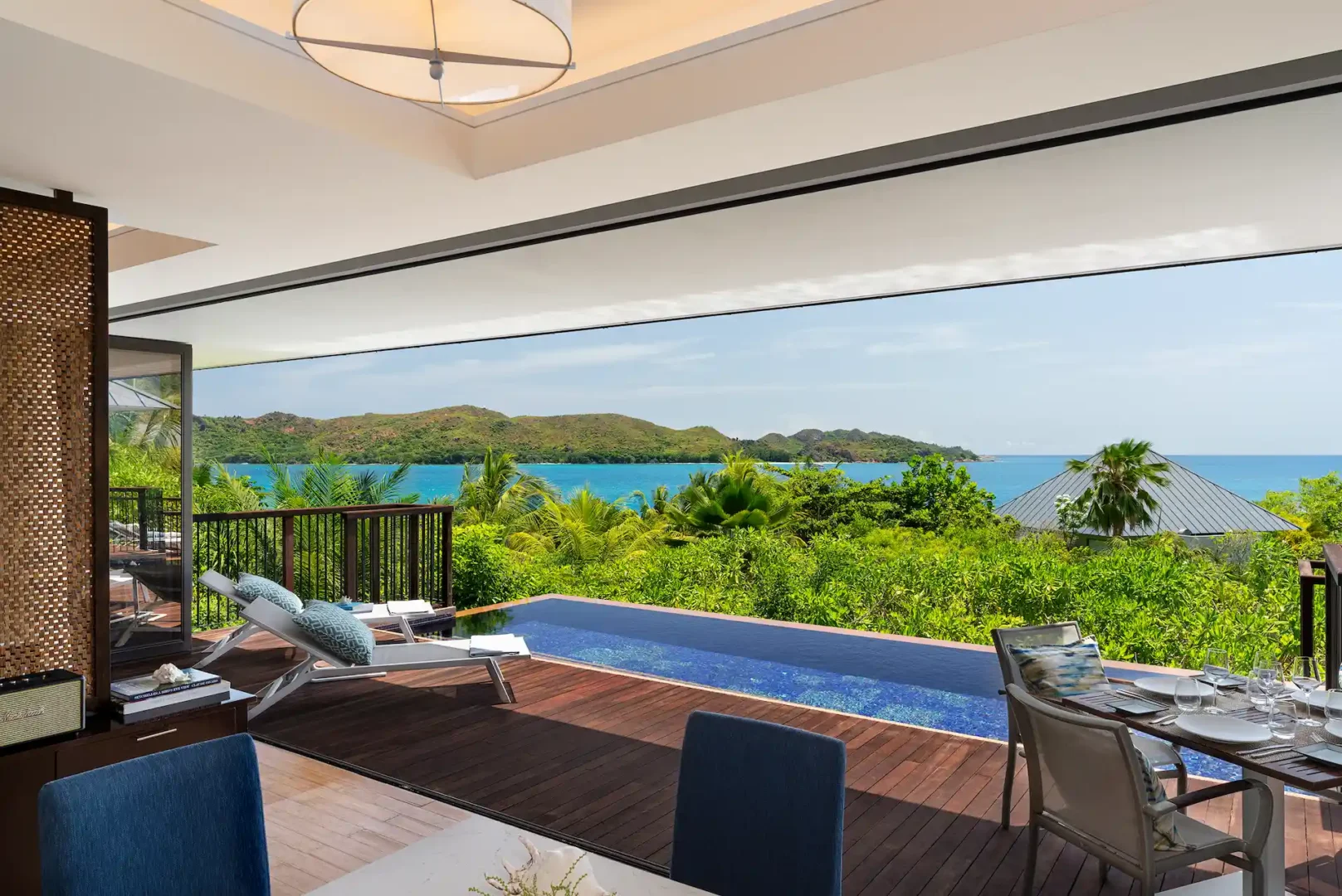 private pool view of two bedroom ocean pool villa in seychelles with turquoise sea and tropical surroundings