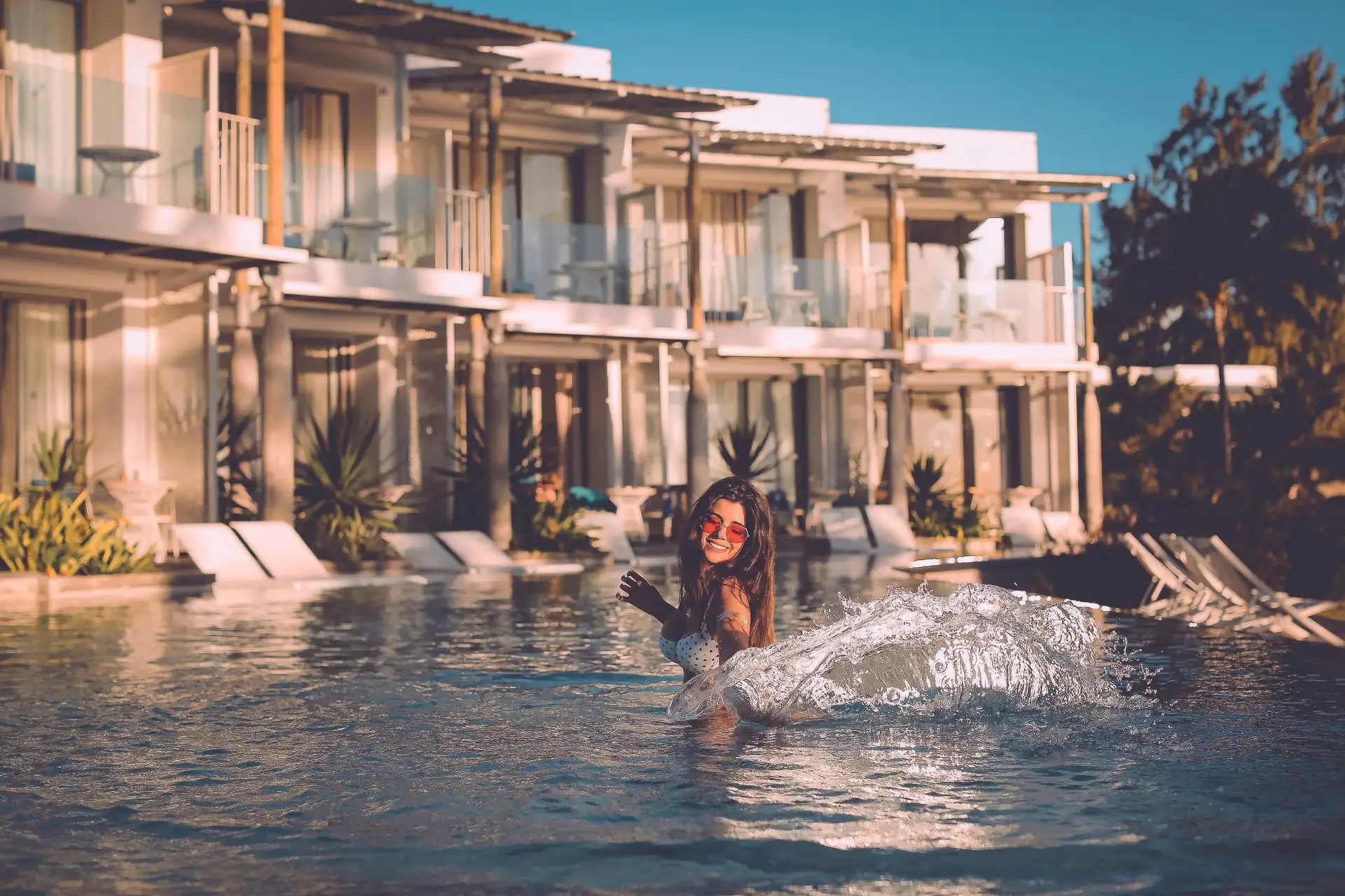 victoria mauritius adults only pool women swimming relaxing at resort poolside