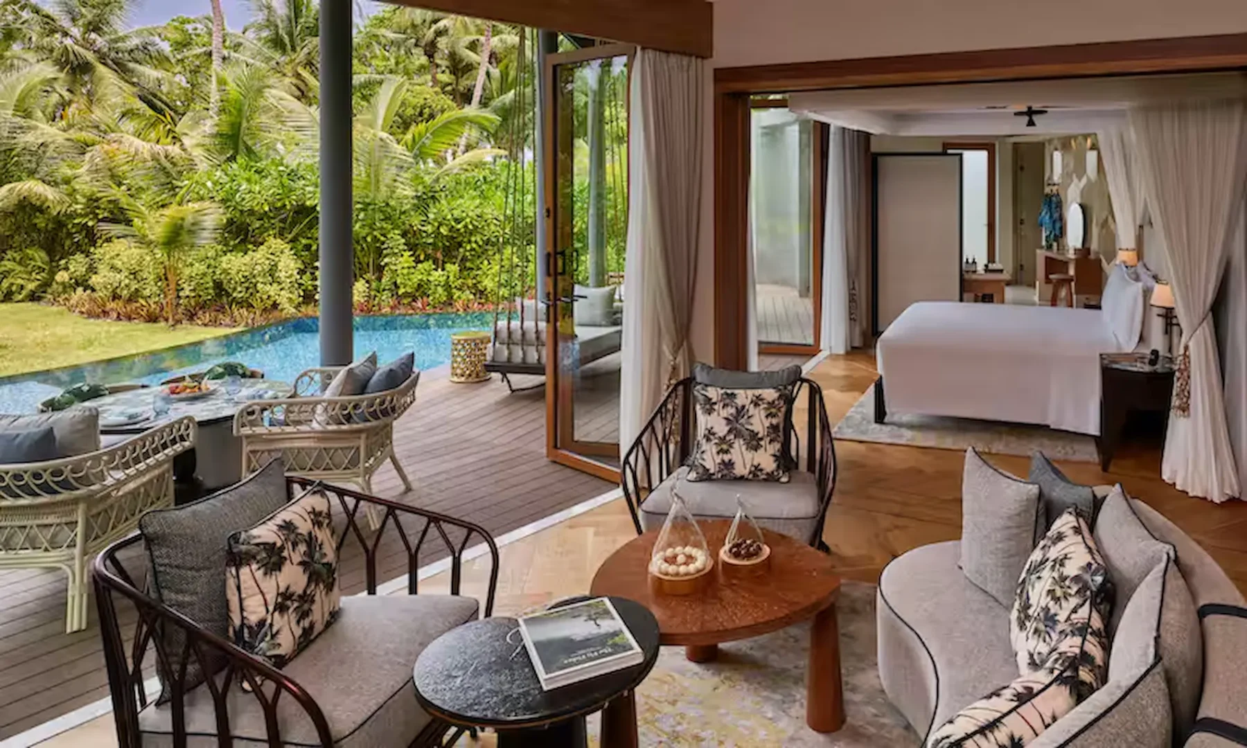 waldorf astoria seychelles one bedroom hawksbill garden pool villa outdoor living area with seating and pool view
