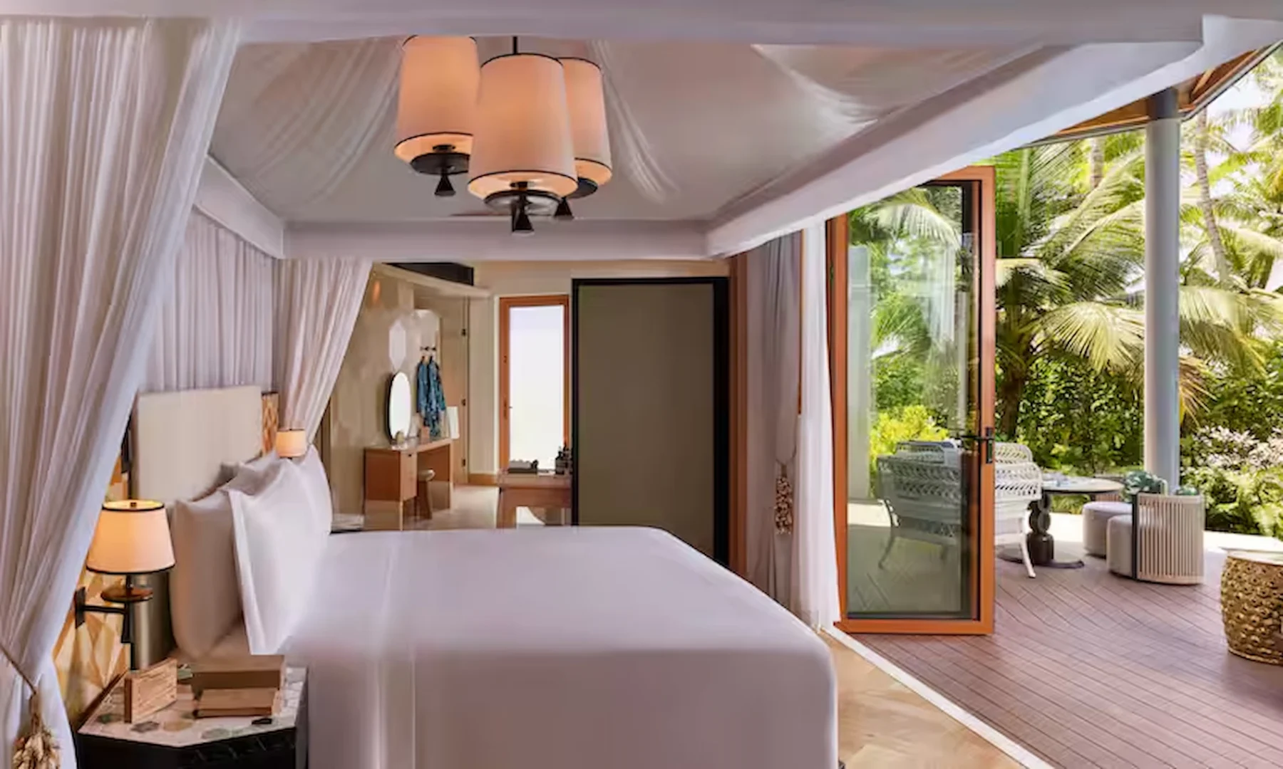 waldorf astoria seychelles one bedroom hawksbill garden pool villa bed with poolside view