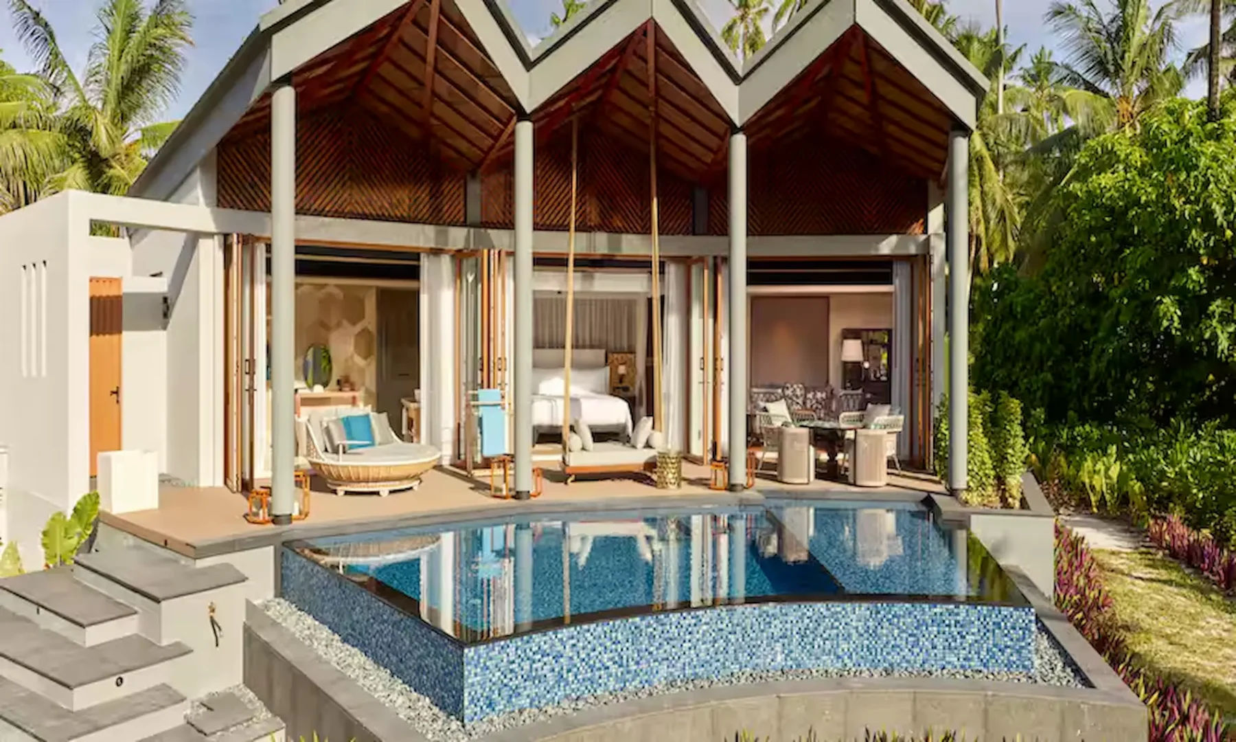 waldorf astoria seychelles one bedroom hawksbill garden pool villa exterior with pool and garden view