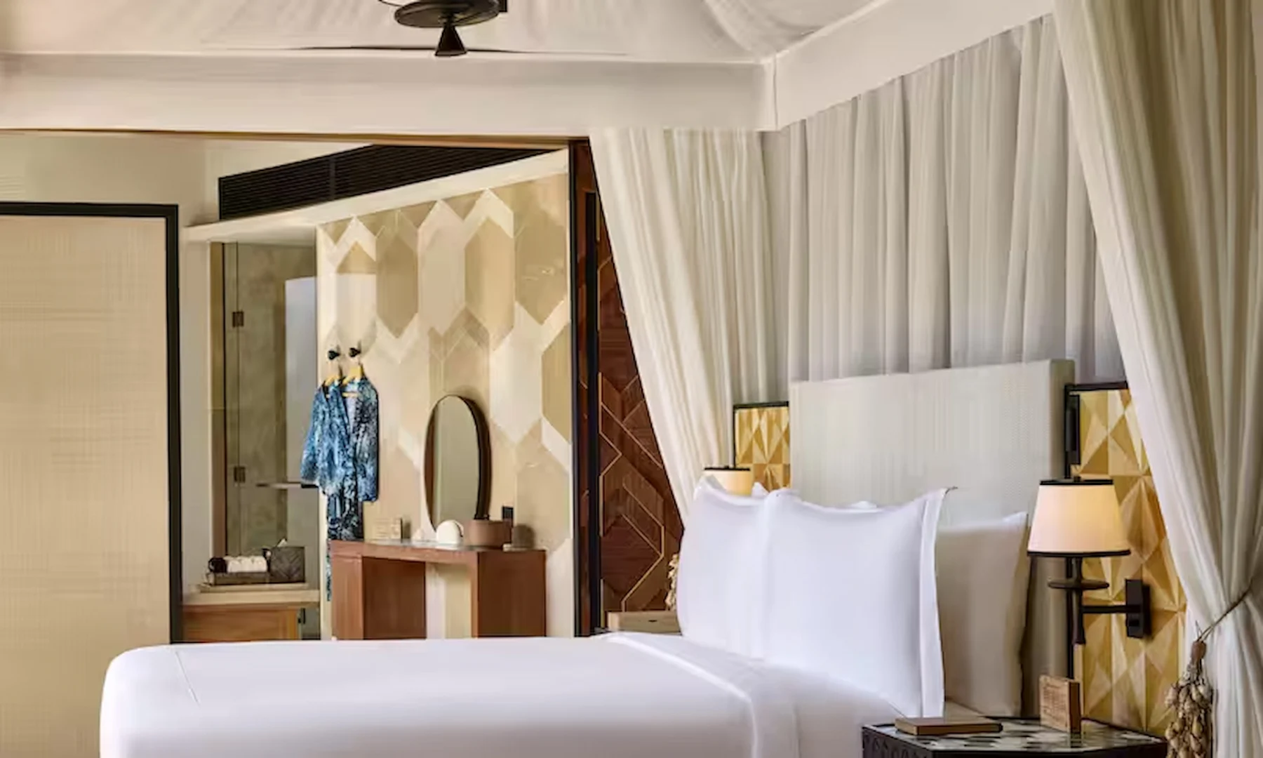 waldorf astoria seychelles one bedroom hawksbill pool villa bed with view of private pool