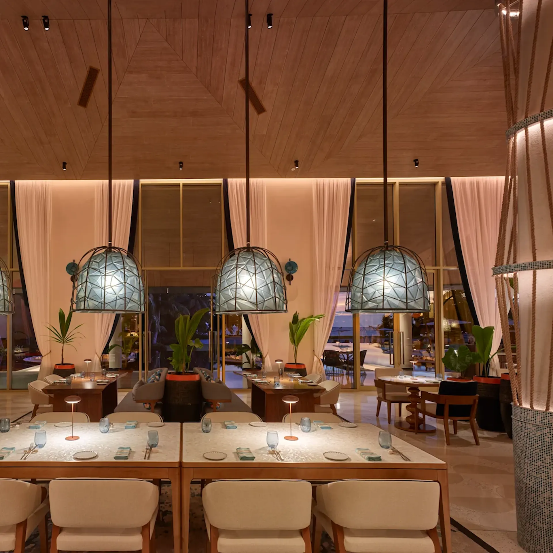 waldorf astoria seychelles platte island le perle restaurant with table setup and ocean view