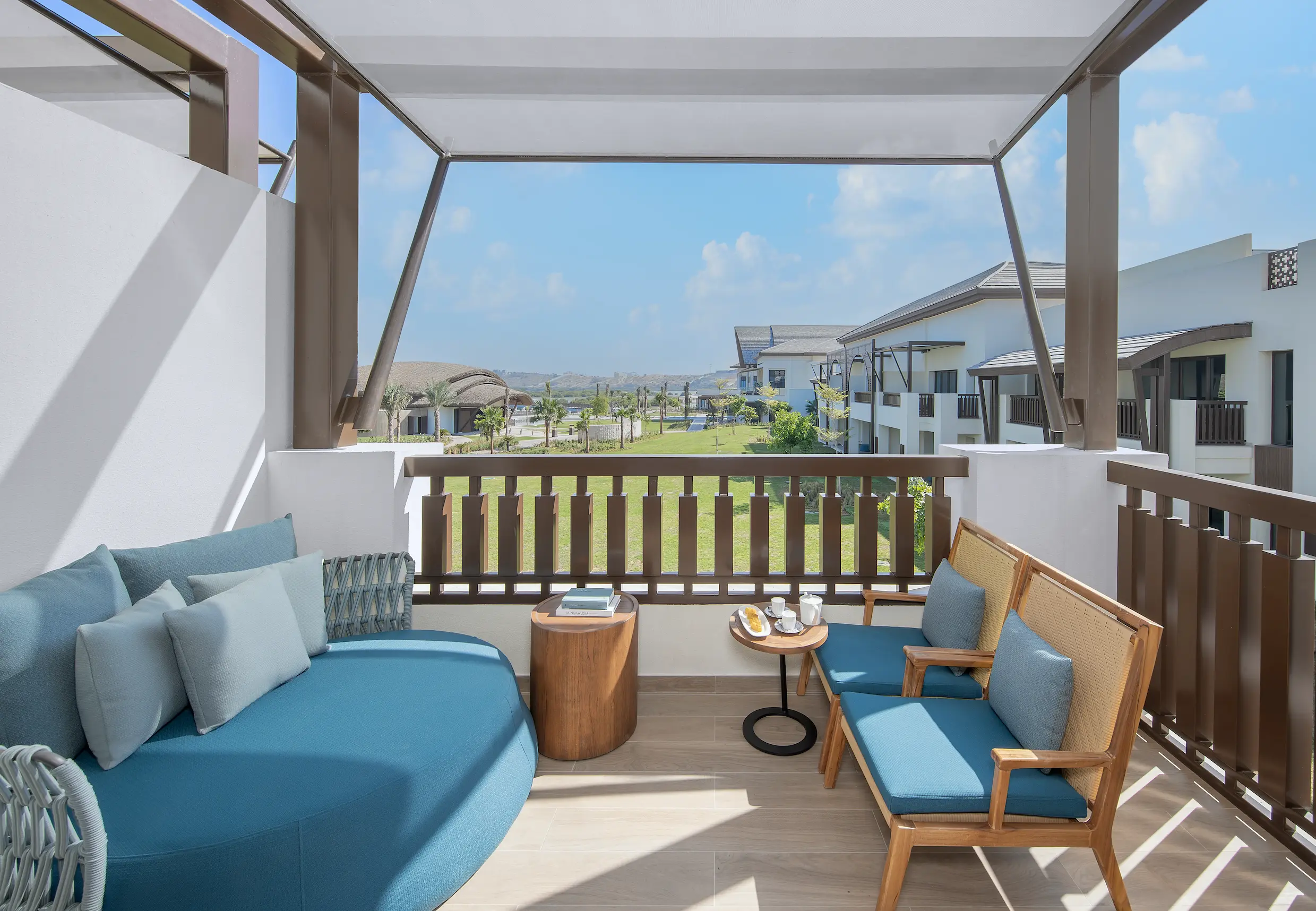 anantara mina ras al khaimah deluxe room garden view showcasing serene landscaped garden vistas enjoyed from the elegant guest room