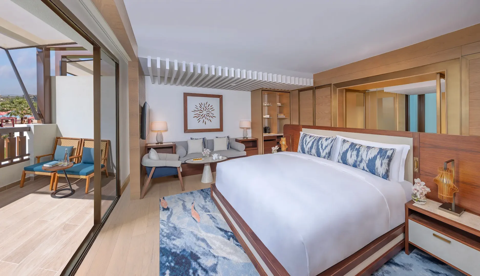 anantara mina ras al khaimah deluxe room pool view showcasing tranquil views across the resort pool from the elegant king guest room