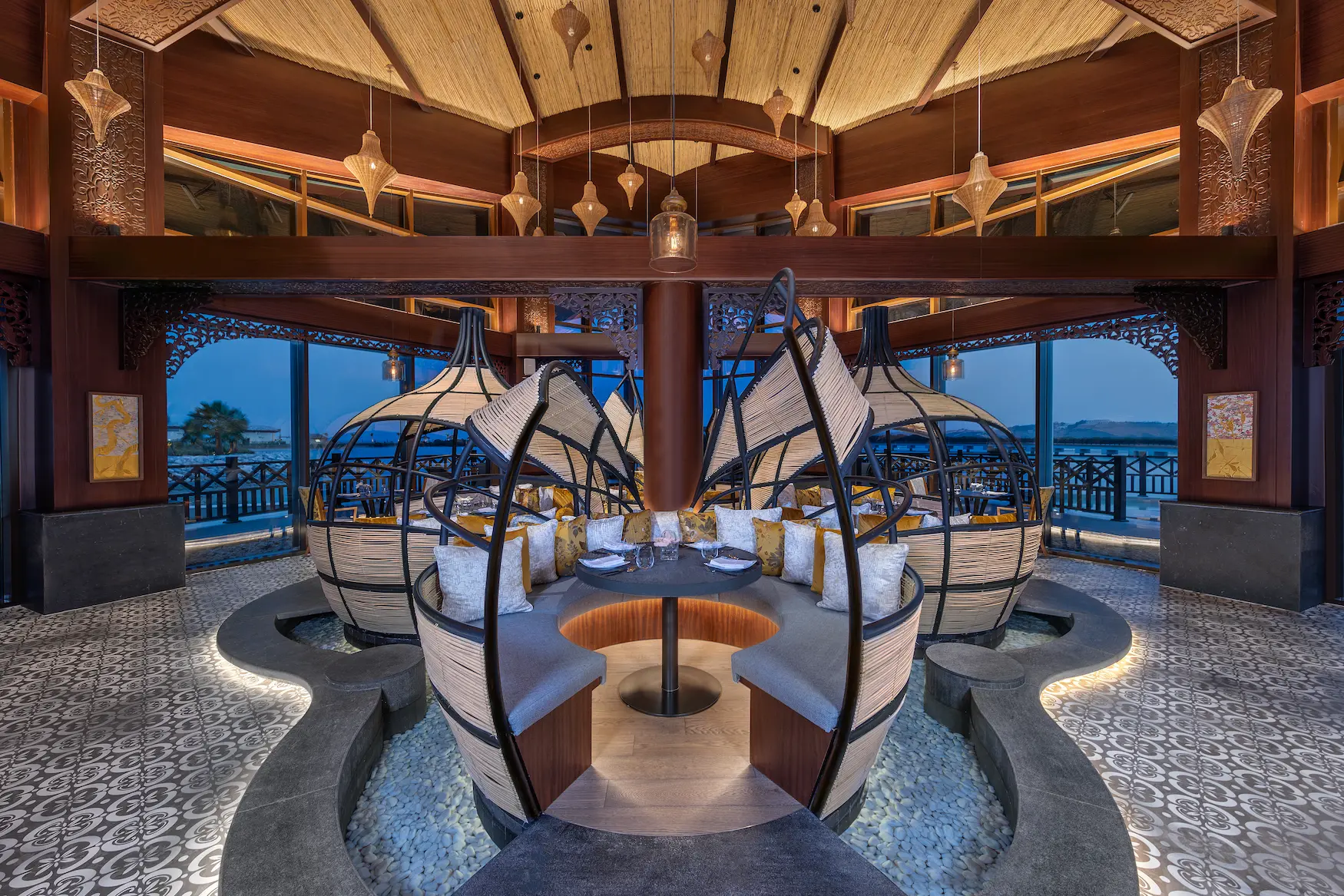 anantara mina ras al khaimah mekong interior showcasing an elegant restaurant interior inspired by refined asian design and warm ambient lighting