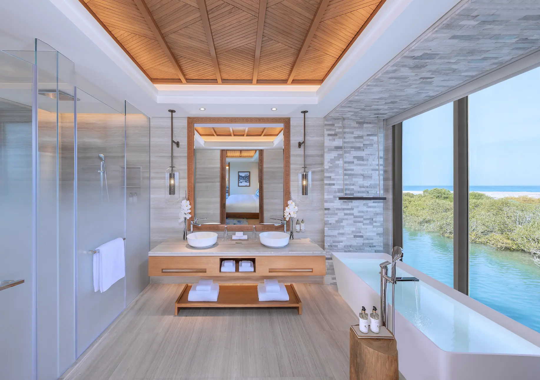 anantara mina ras al khaimah over water pool villa bathroom featuring a refined bathroom space with elegant finishes and panoramic lagoon surroundings