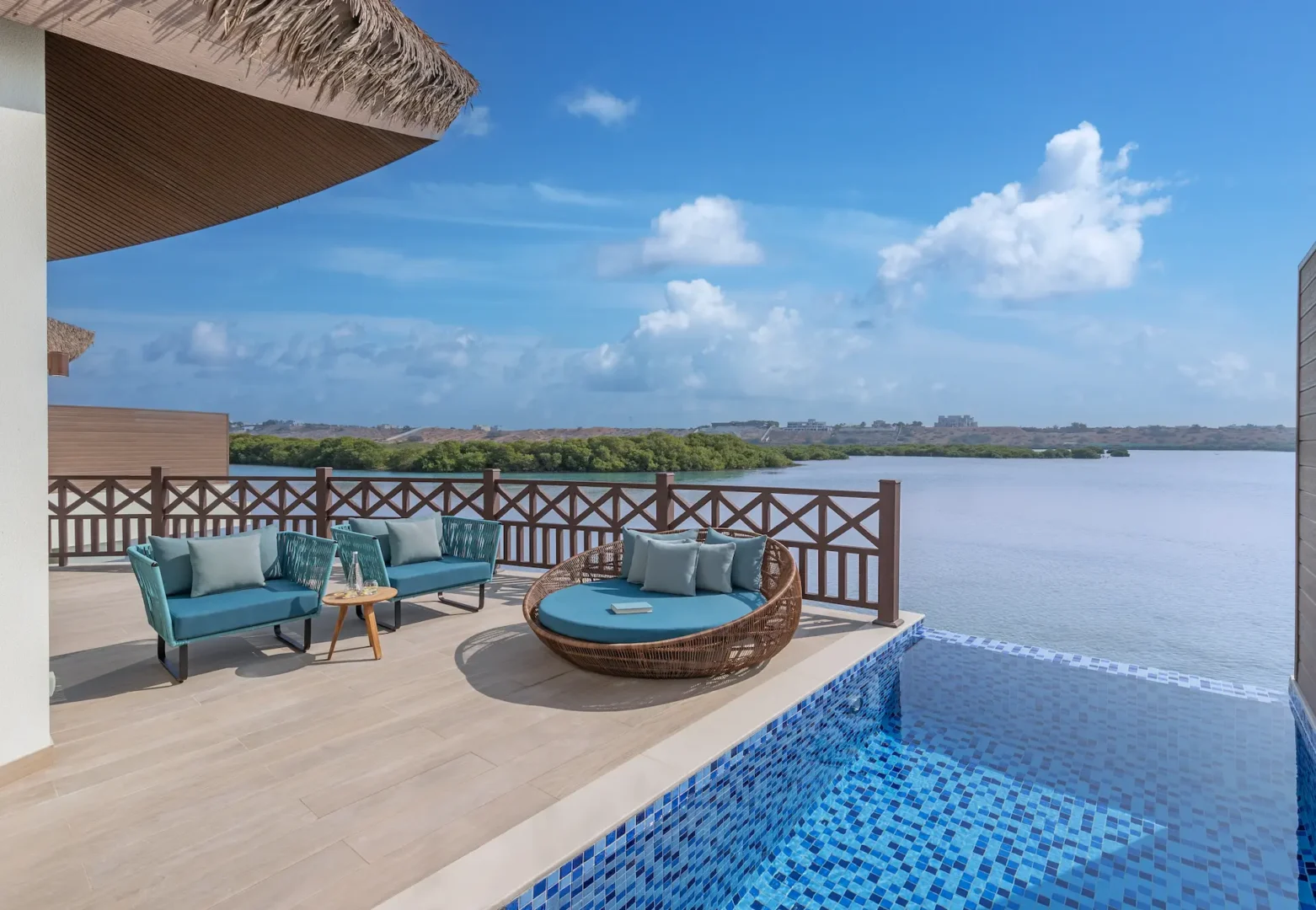 anantara mina ras al khaimah over water pool villa terrace featuring a private outdoor terrace extending above the tranquil lagoon