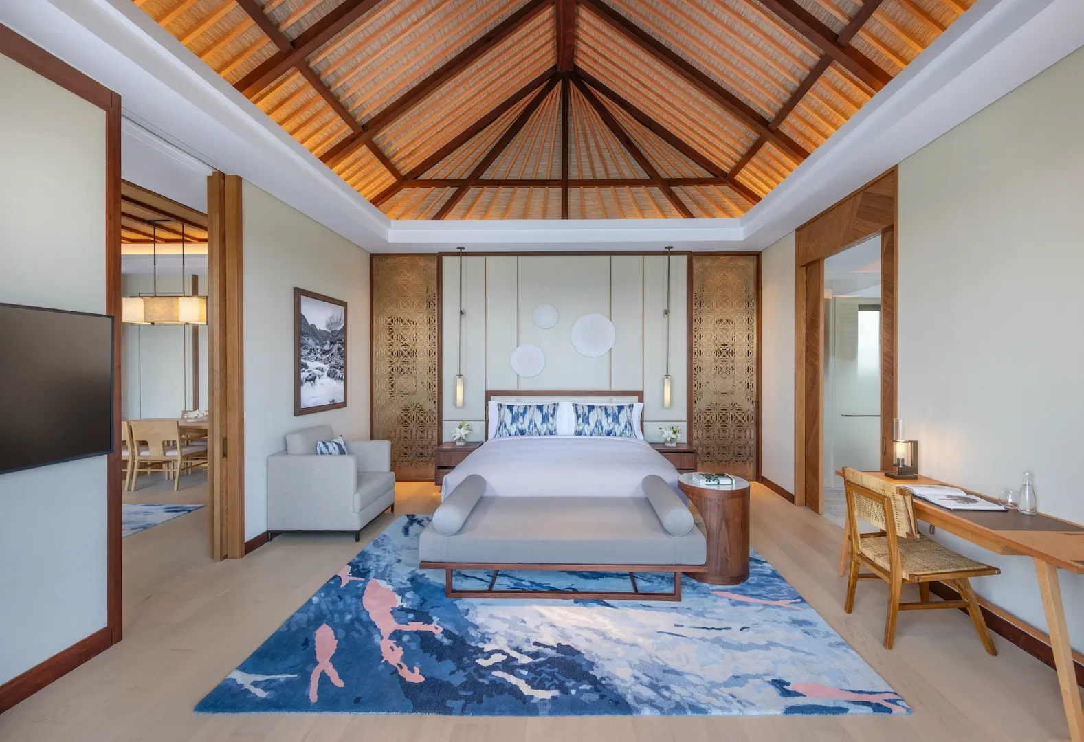 anantara mina ras al khaimah peninsula sea view pool villa bedroom featuring an elegant bedroom with uninterrupted sea views and refined coastal design