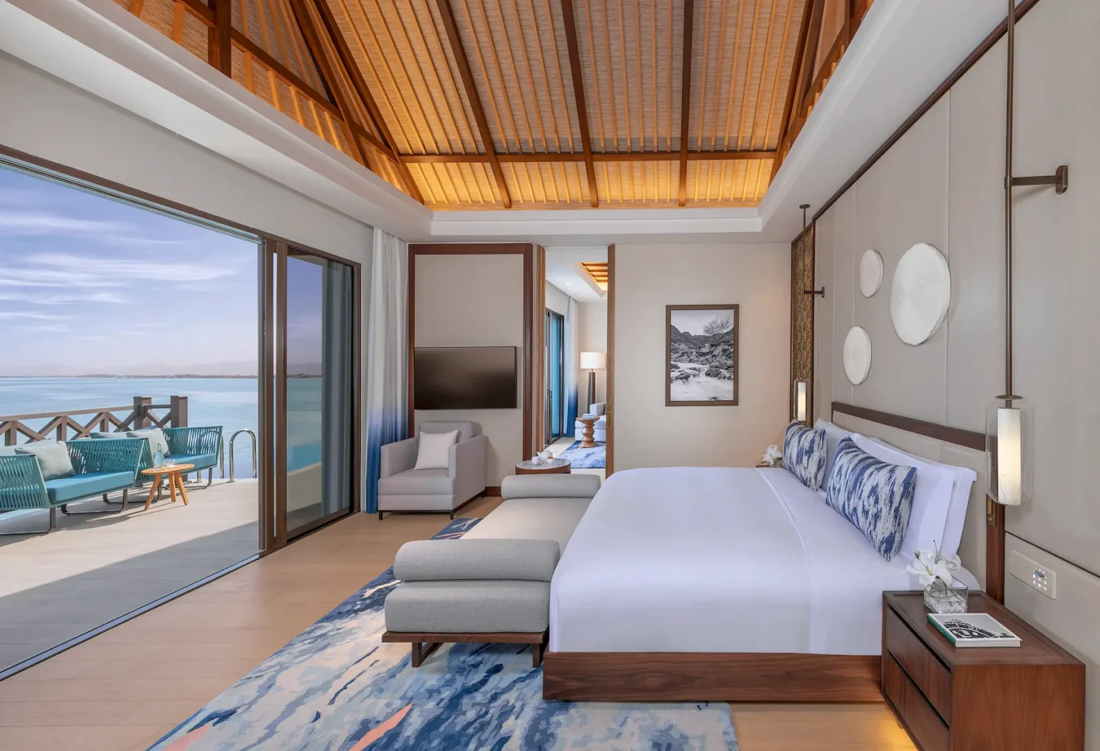 anantara mina ras al khaimah peninsula sea view pool villa bedroom featuring an elegant villa bedroom with expansive sea views and refined coastal design