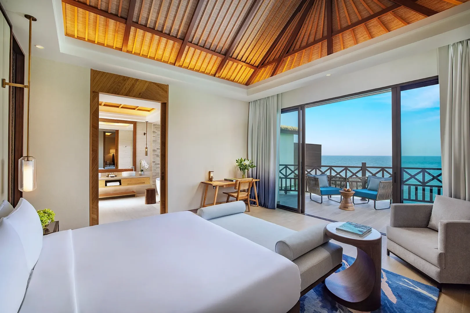 anantara mina ras al khaimah peninsula sea view pool villa bedroom view showcasing sweeping sea views enjoyed from the elegant villa bedroom