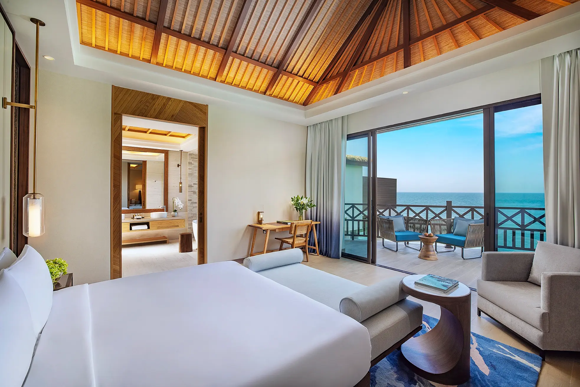 anantara mina ras al khaimah peninsula sea view pool villa bedroom view showcasing sweeping sea views enjoyed from the elegant villa bedroom