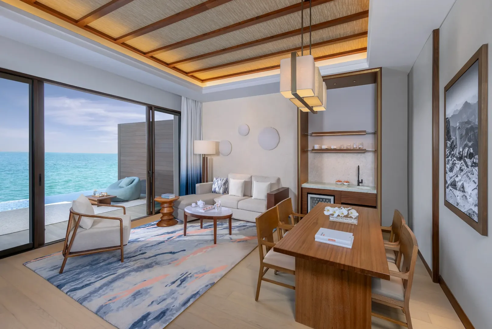 anantara mina ras al khaimah peninsula sea view pool villa living room featuring a spacious and refined living area with seamless views toward the sea