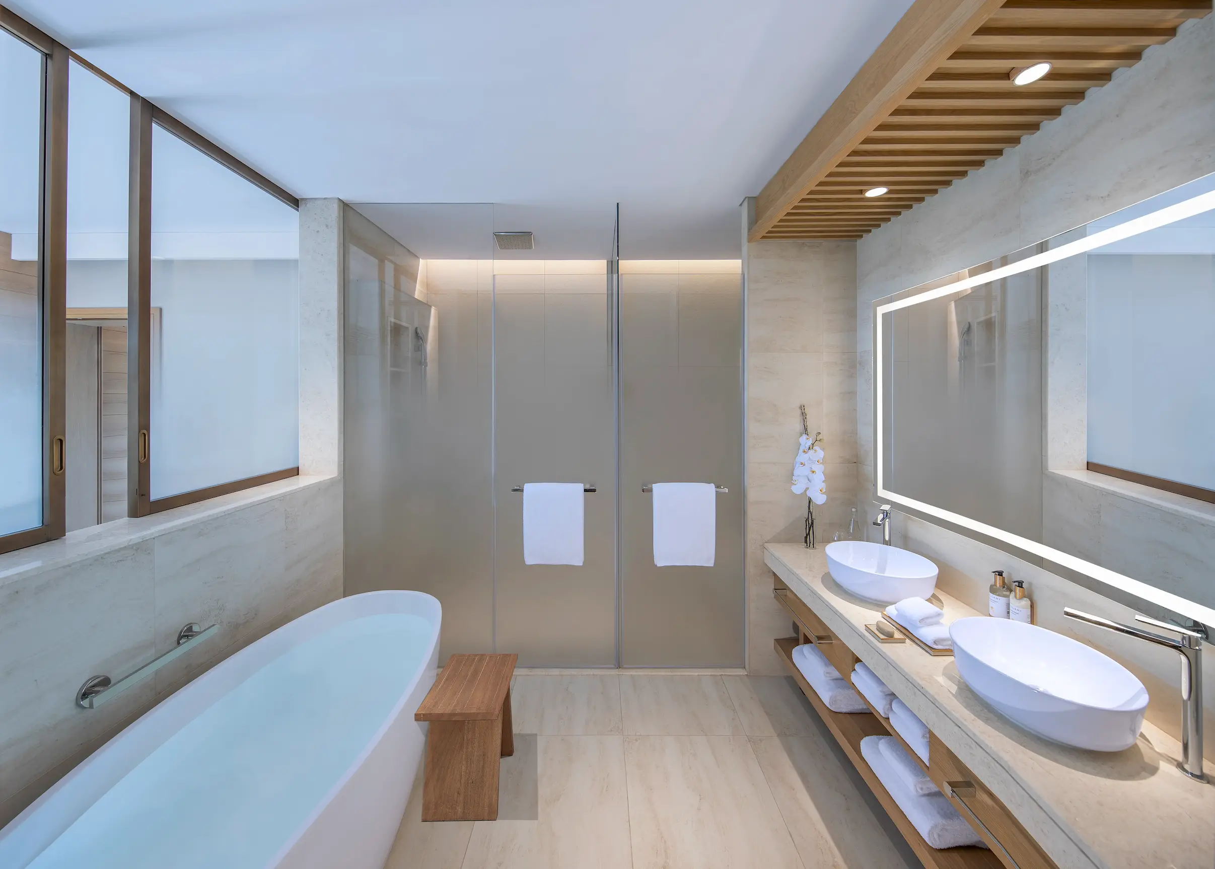 anantara mina ras al khaimah premier garden terrace room bathroom side view showcasing a refined bathroom space with elegant finishes