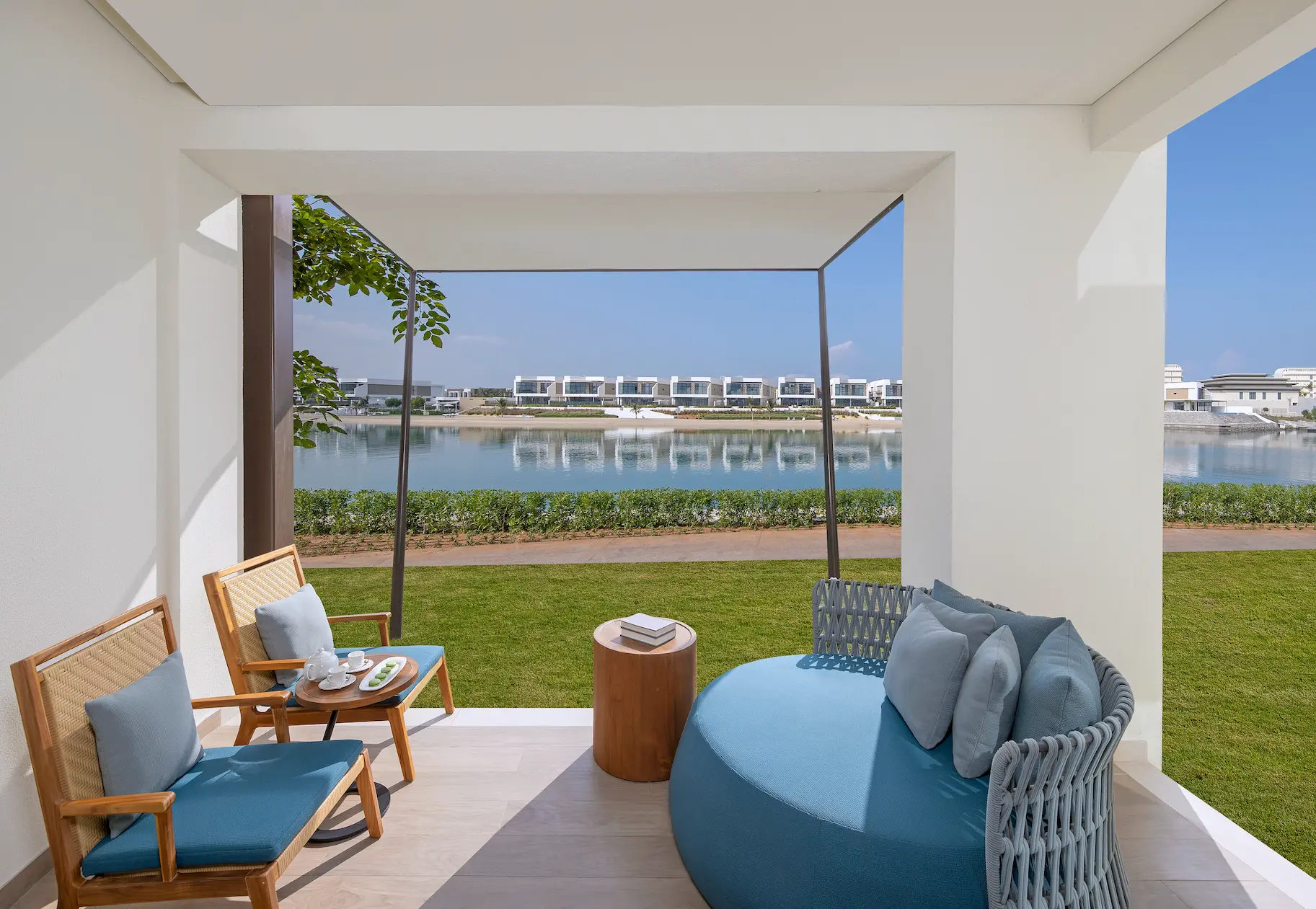 anantara mina ras al khaimah premier garden terrace room terrace lagoon view featuring a private outdoor terrace overlooking the tranquil lagoon
