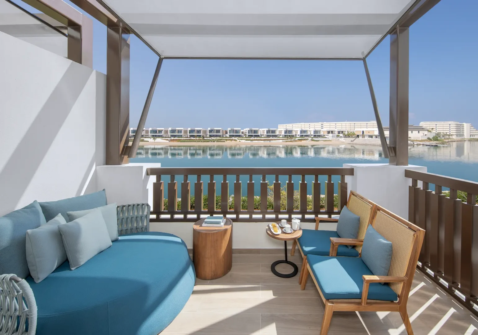 anantara mina ras al khaimah premier room sea view showcasing expansive coastal views enjoyed from the elegant guest room