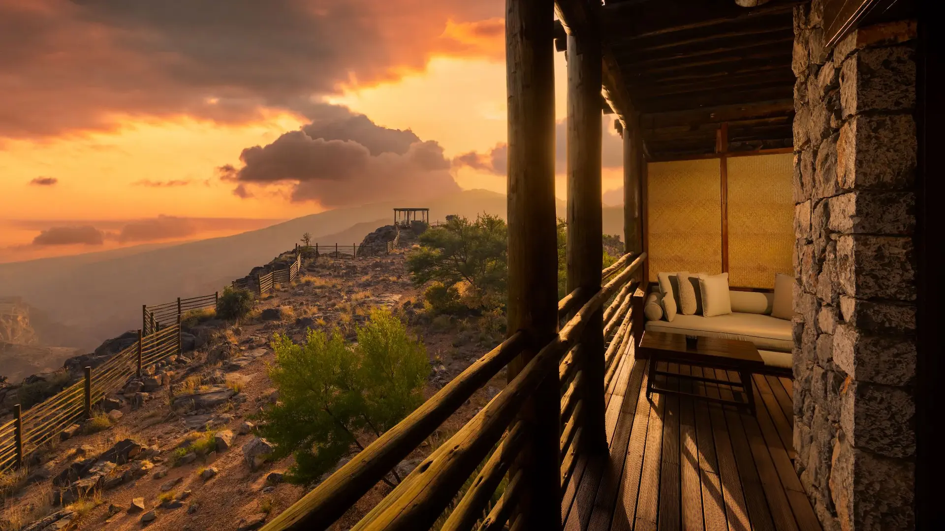 balcony at sunset with jabal ridge view at alila jabal akhdar oman
