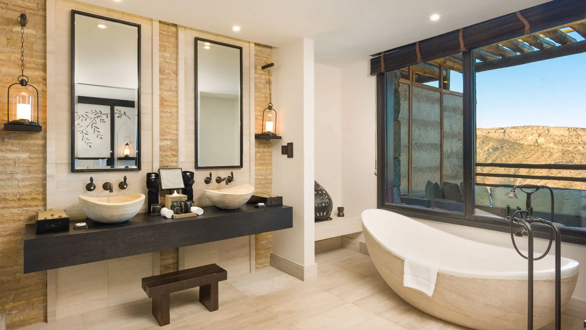 bathroom with jabal ridge view at alila jabal akhdar oman